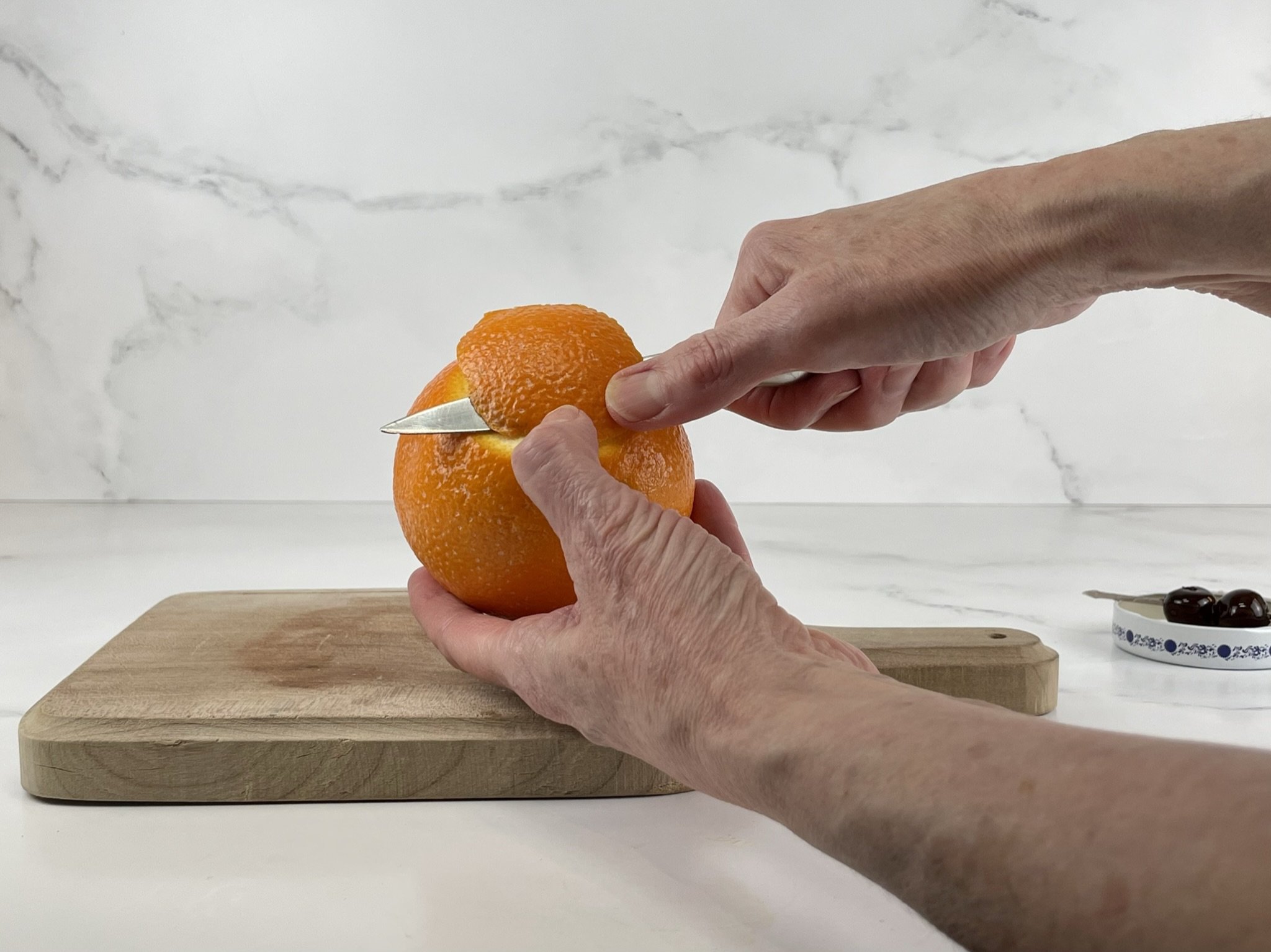 Cut orange peel.