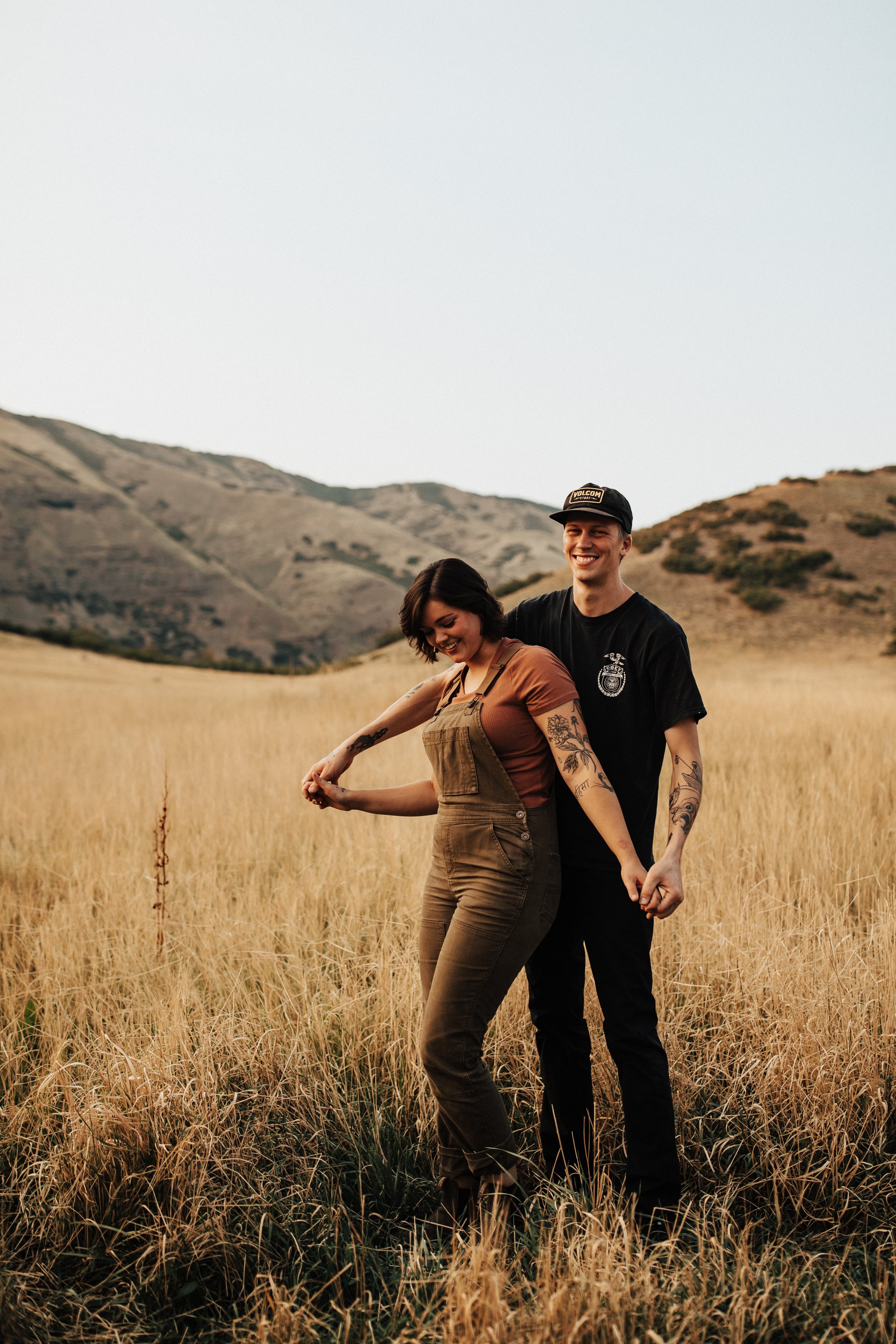 mountain-feild-couple-photos-with-dog-engagement-session-brayden-and-syd-photography-engagement-session-outfit-inspiration-couples-session-with-dog-utah-photographer