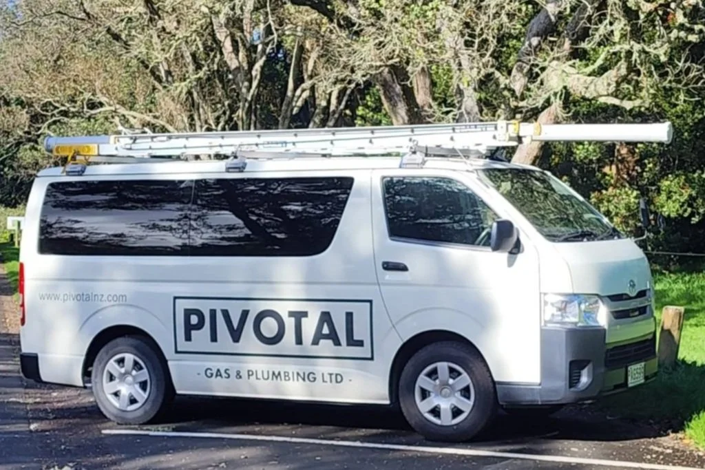 Pivotal Gas & Plumbing team with service van
