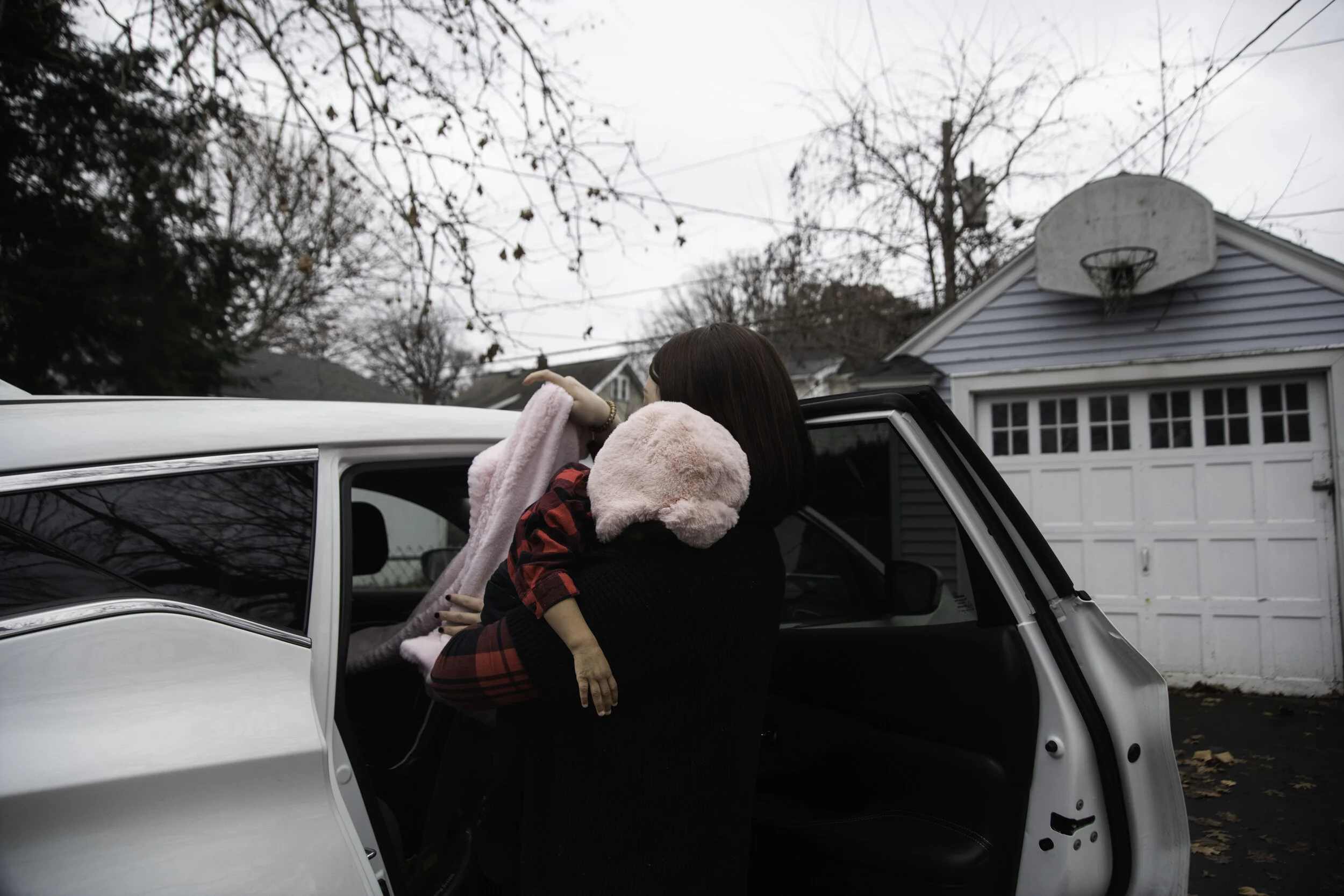 After a few hours of shopping, Sunny was worn out, falling asleep on the car ride home. Julia always gets her out of the car and into bed before getting the bags.