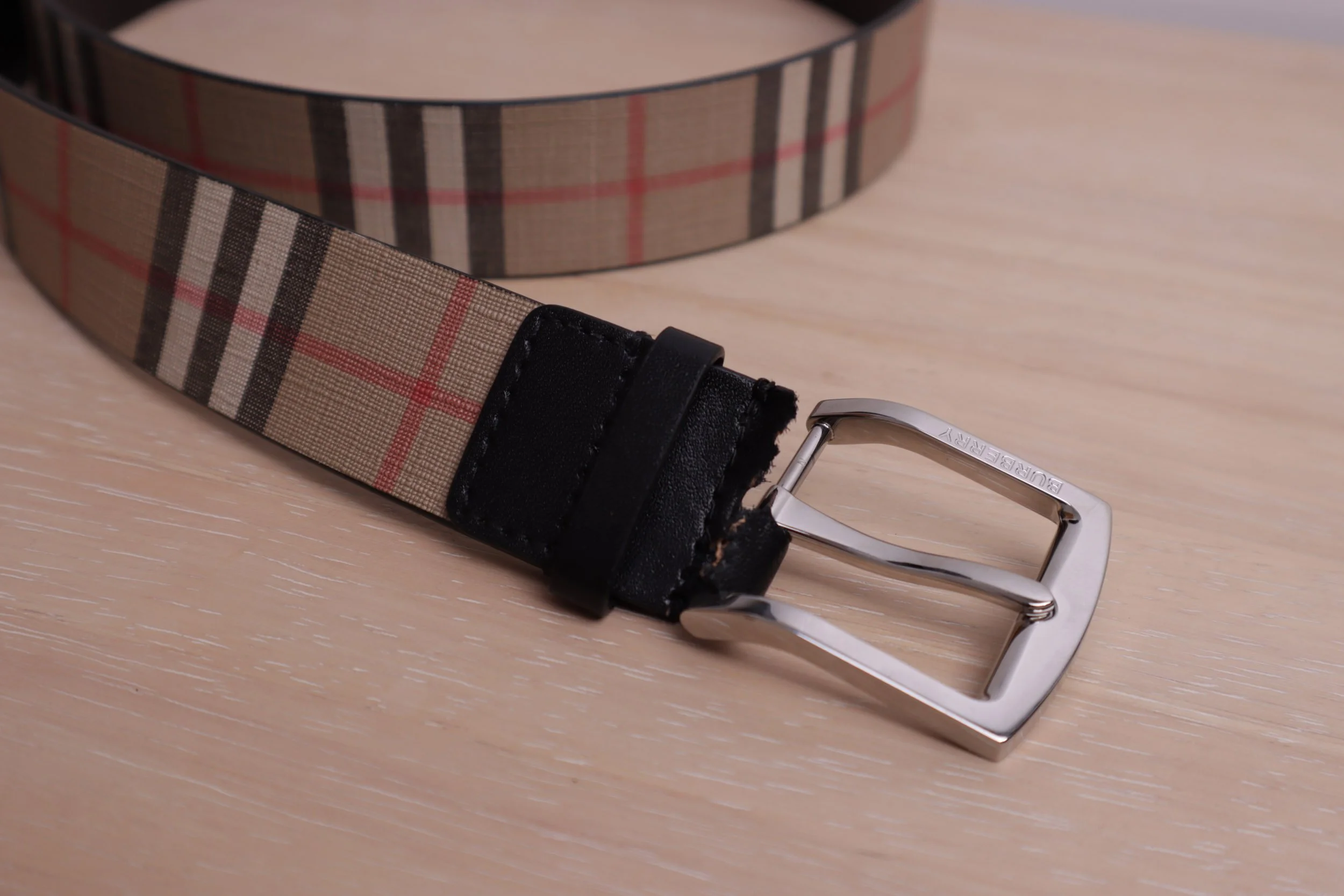 Before Image - Broken leather on the Burberry belt