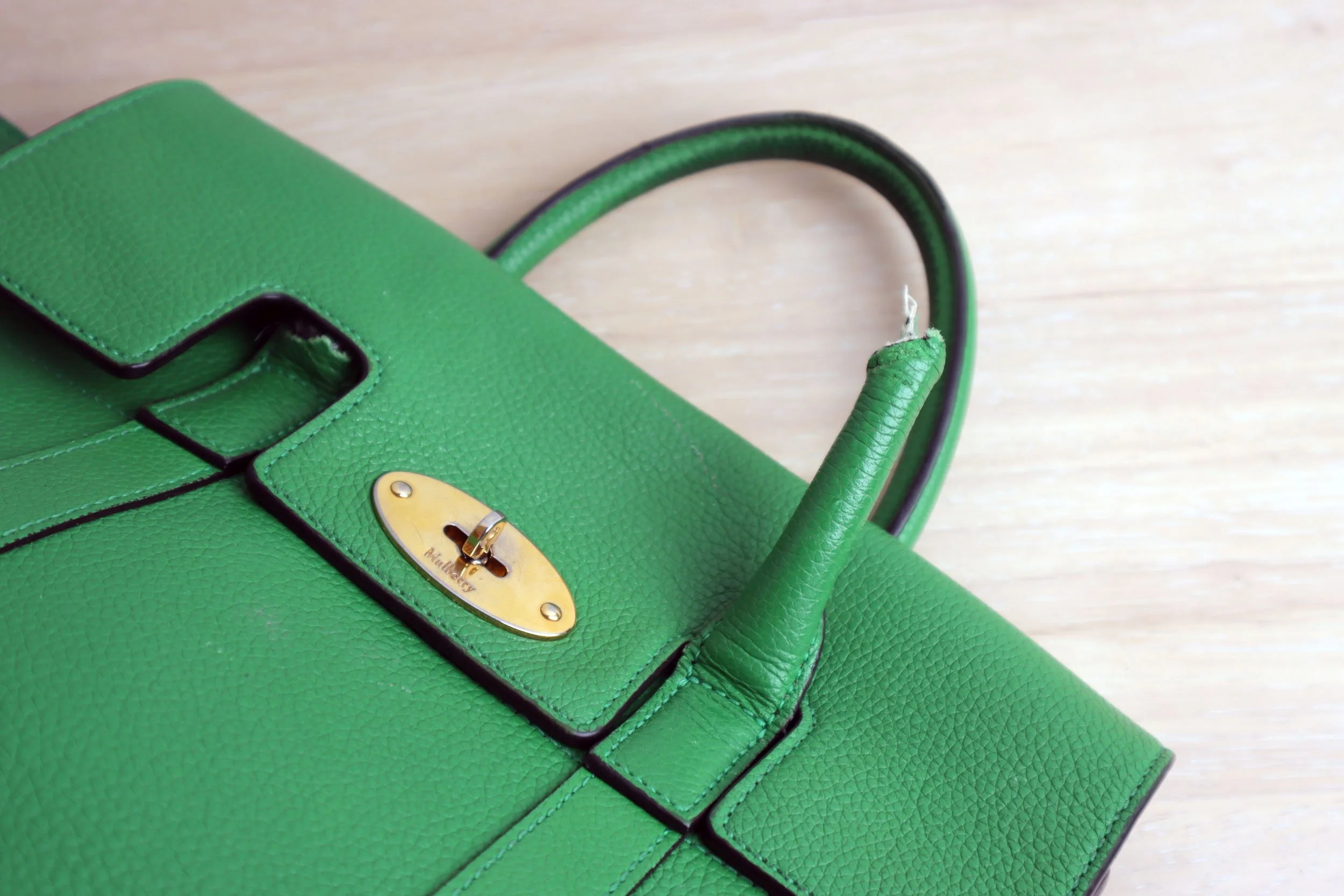 Mulberry Green Chewed Back Before Handle v2.jpg