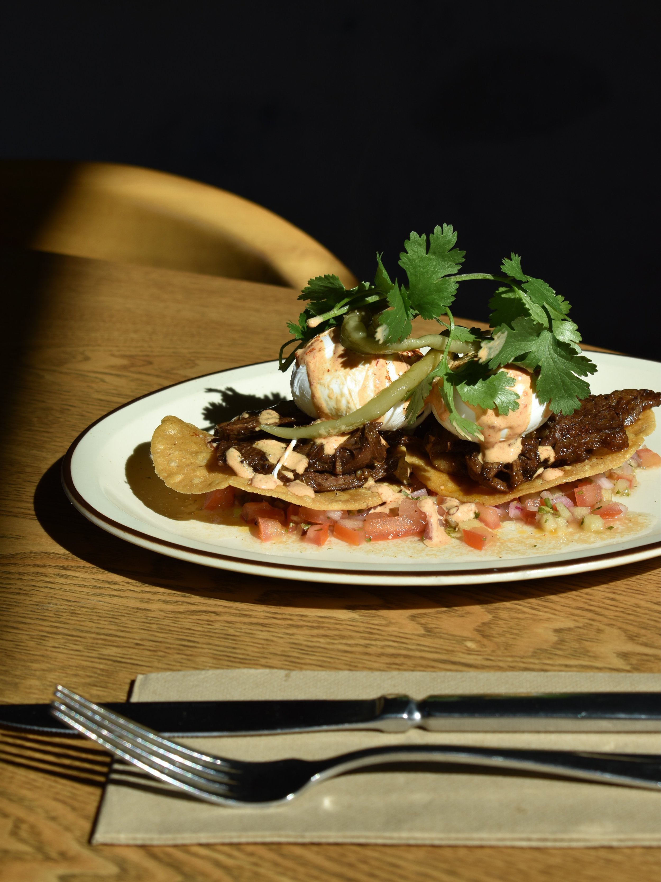 Our 6-hour brisket tacos are more delicious in the sunshine ☀️ 

As is an iced latte 💅 

We&rsquo;re so excited that summer is coming. Bring on shorts season! 

And more days on our balcony with a view ❤️&zwj;🔥