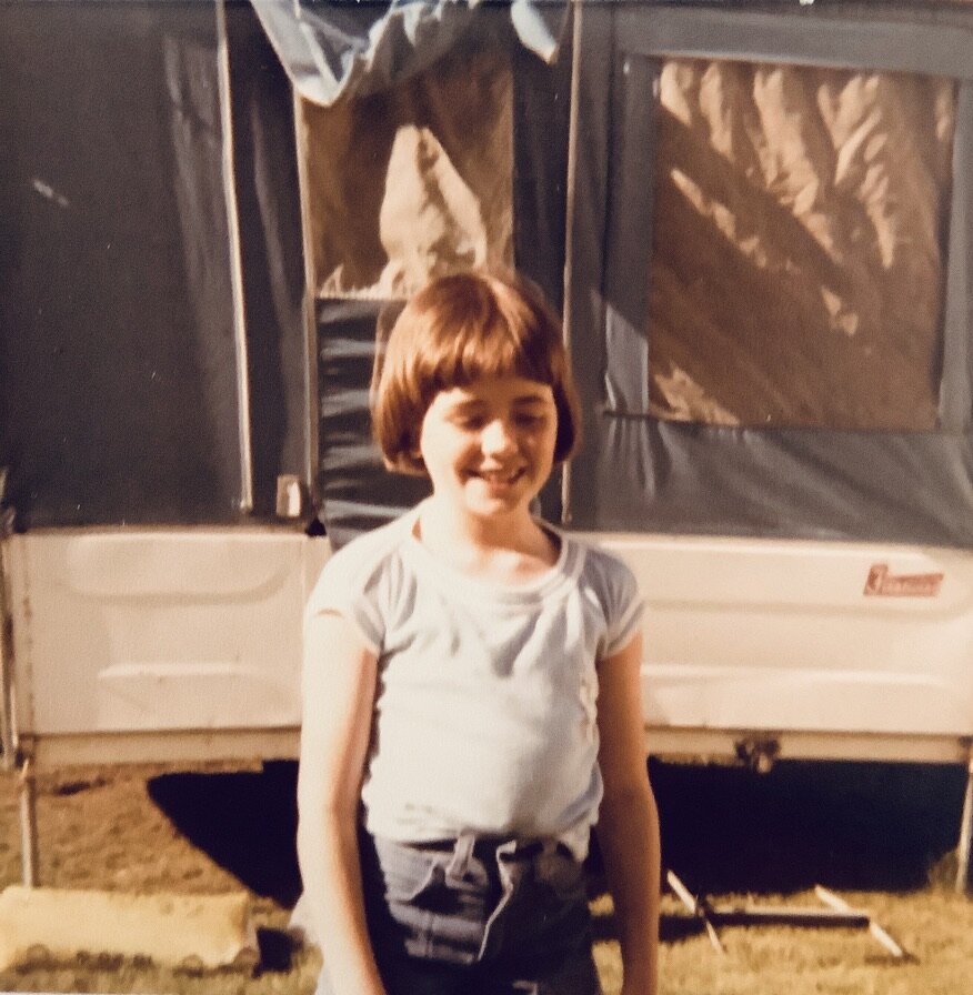 9 Allie in front of camper eyes closed.jpeg