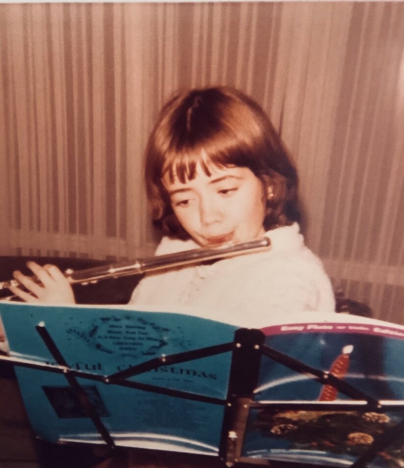 10 Allie playing flute.jpeg