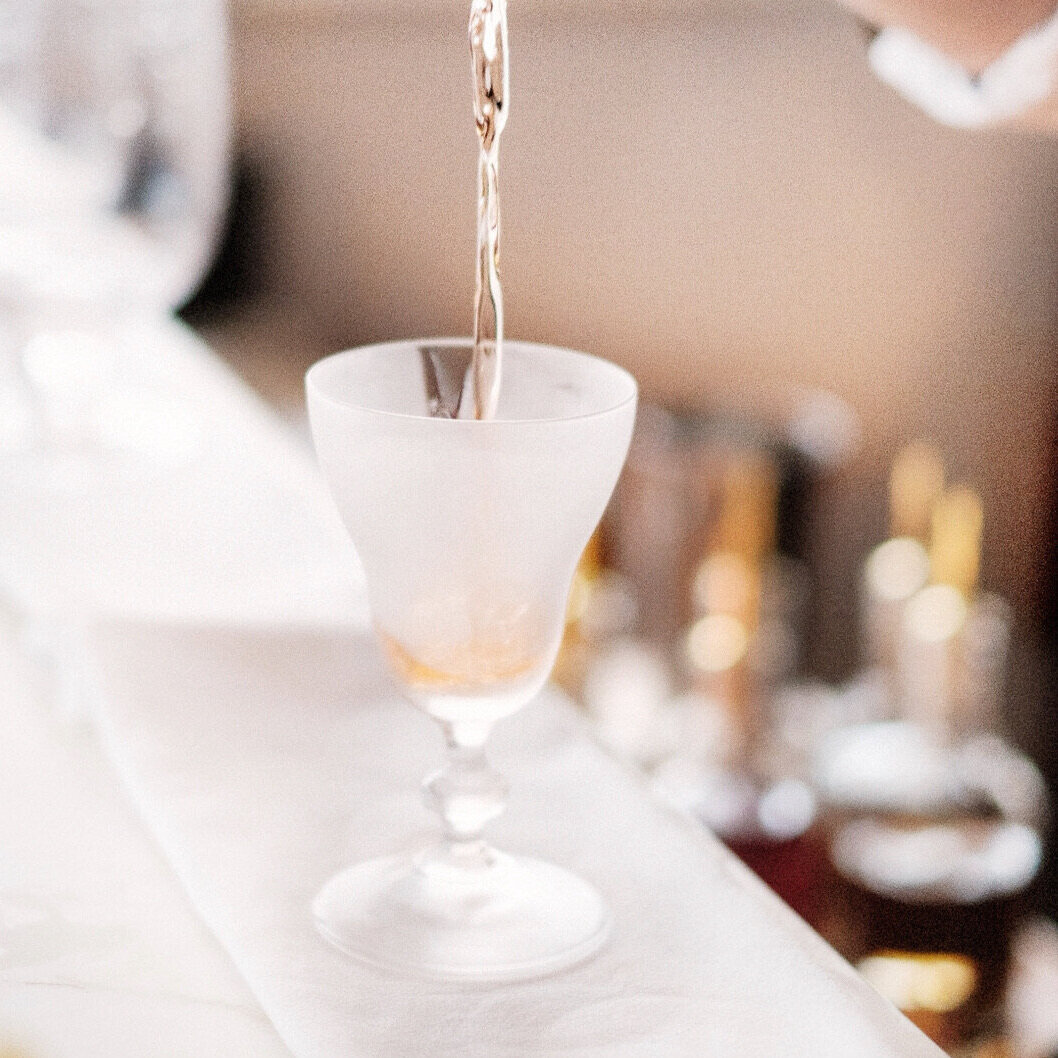 Cocktail being poured at The Commerce Inn