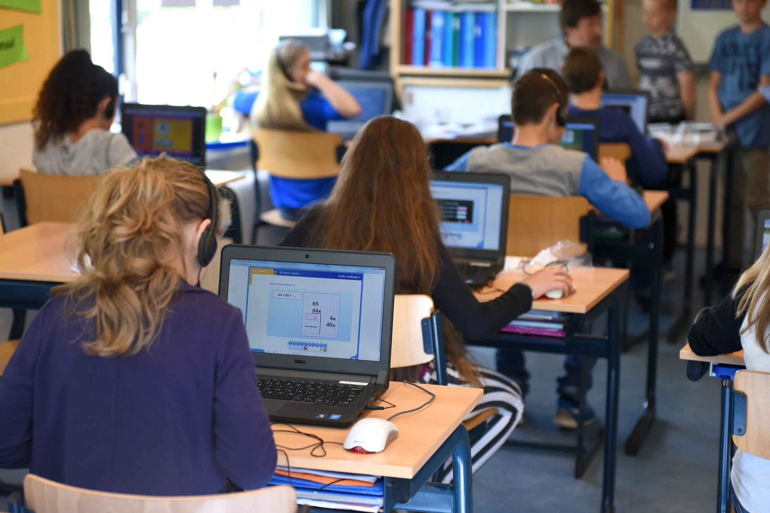 Students in class using computers