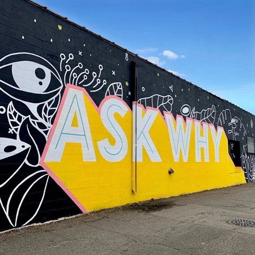 “Ask why,” mural