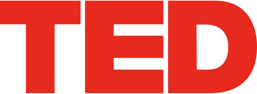 Close-up of the red and black logo of TED, a well-known media organization focusing on TED Talks.