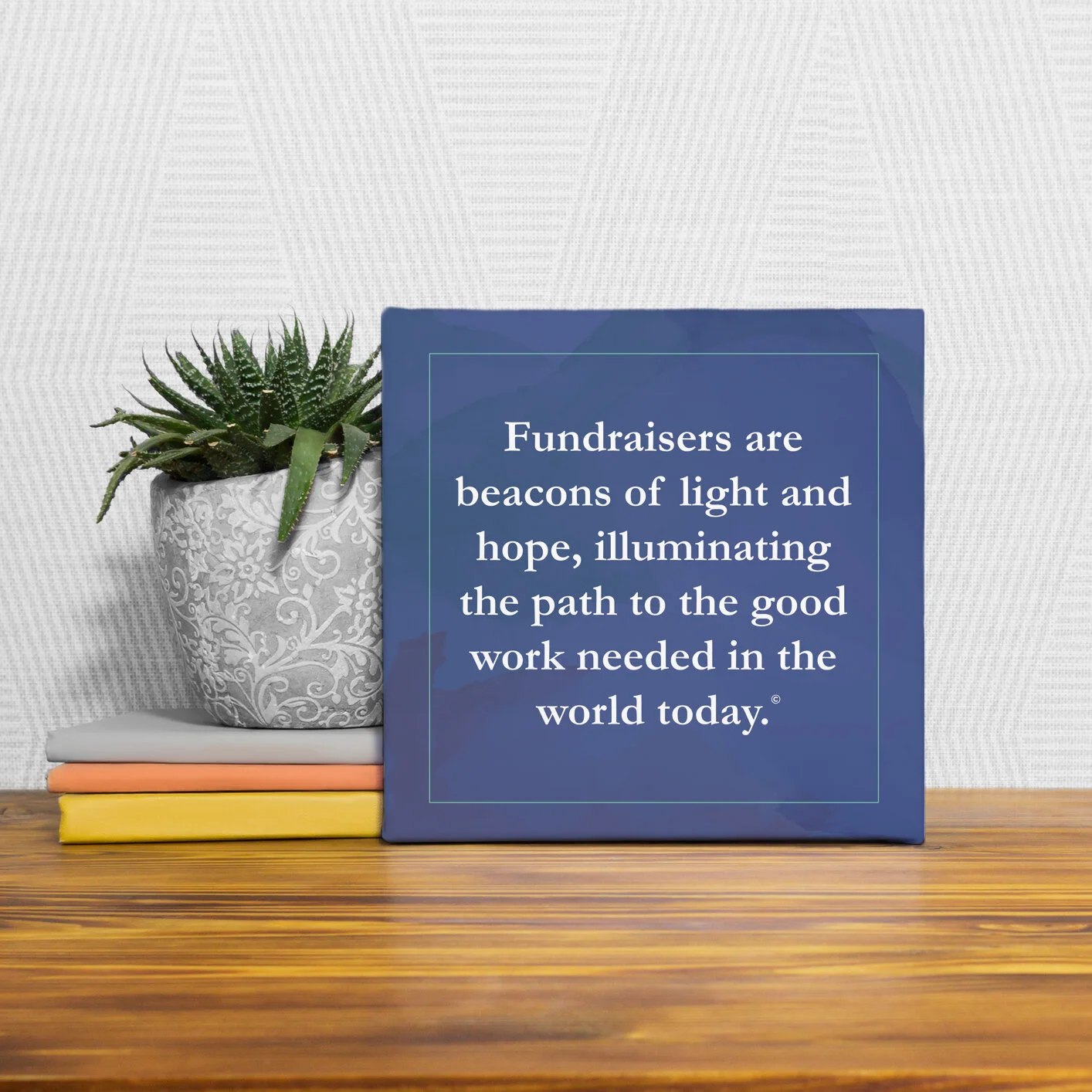 fundraising-themed wall art on blue background with turquoise accents and white text