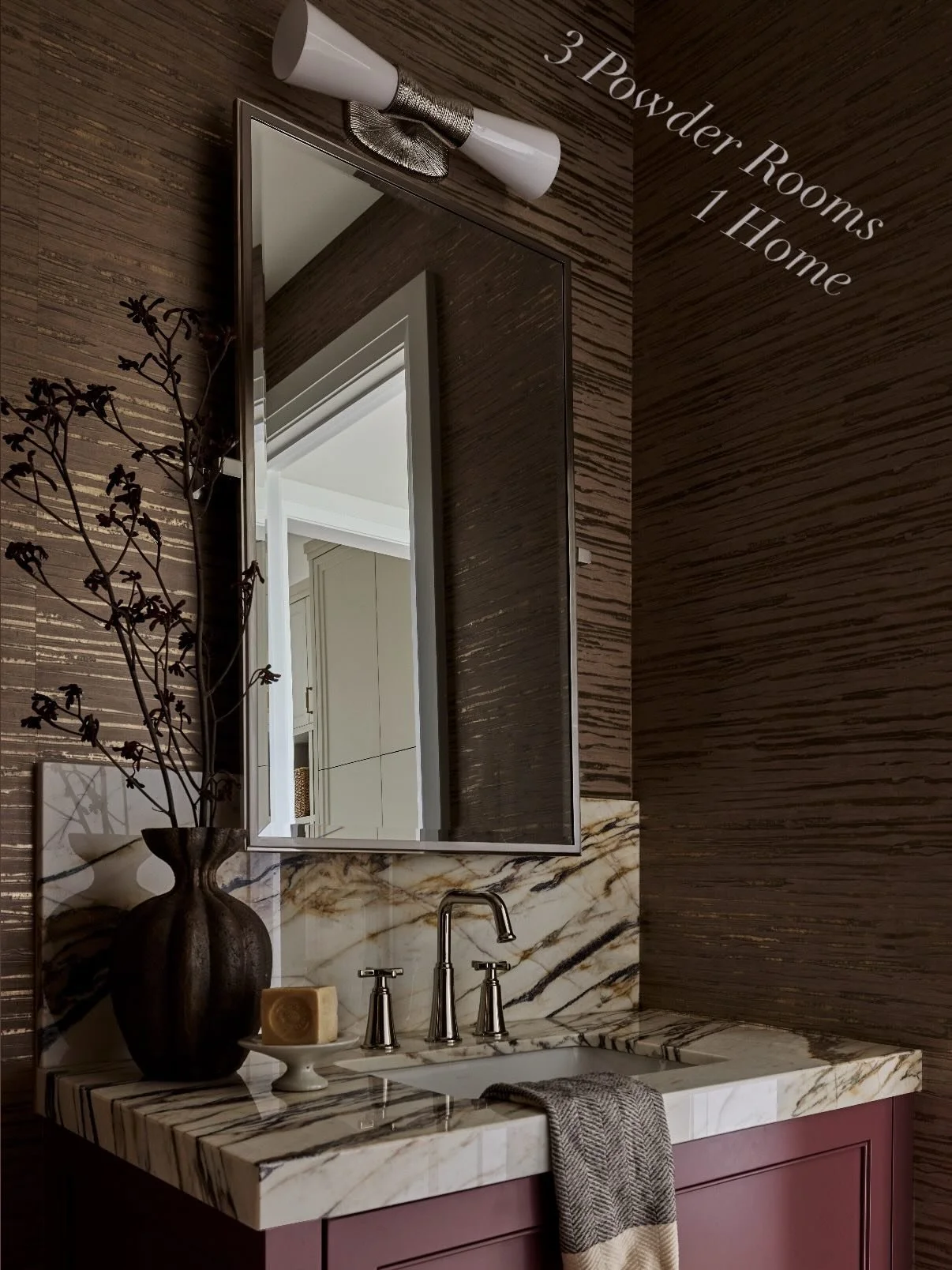 Three powder rooms.  One home.

Color + layers, warmth + texture, or dark + moody -
where are you landing?

A study in powder room design.  Layering marble and quartzite, statement wallpaper, and custom millwork to create three completely distinct mo