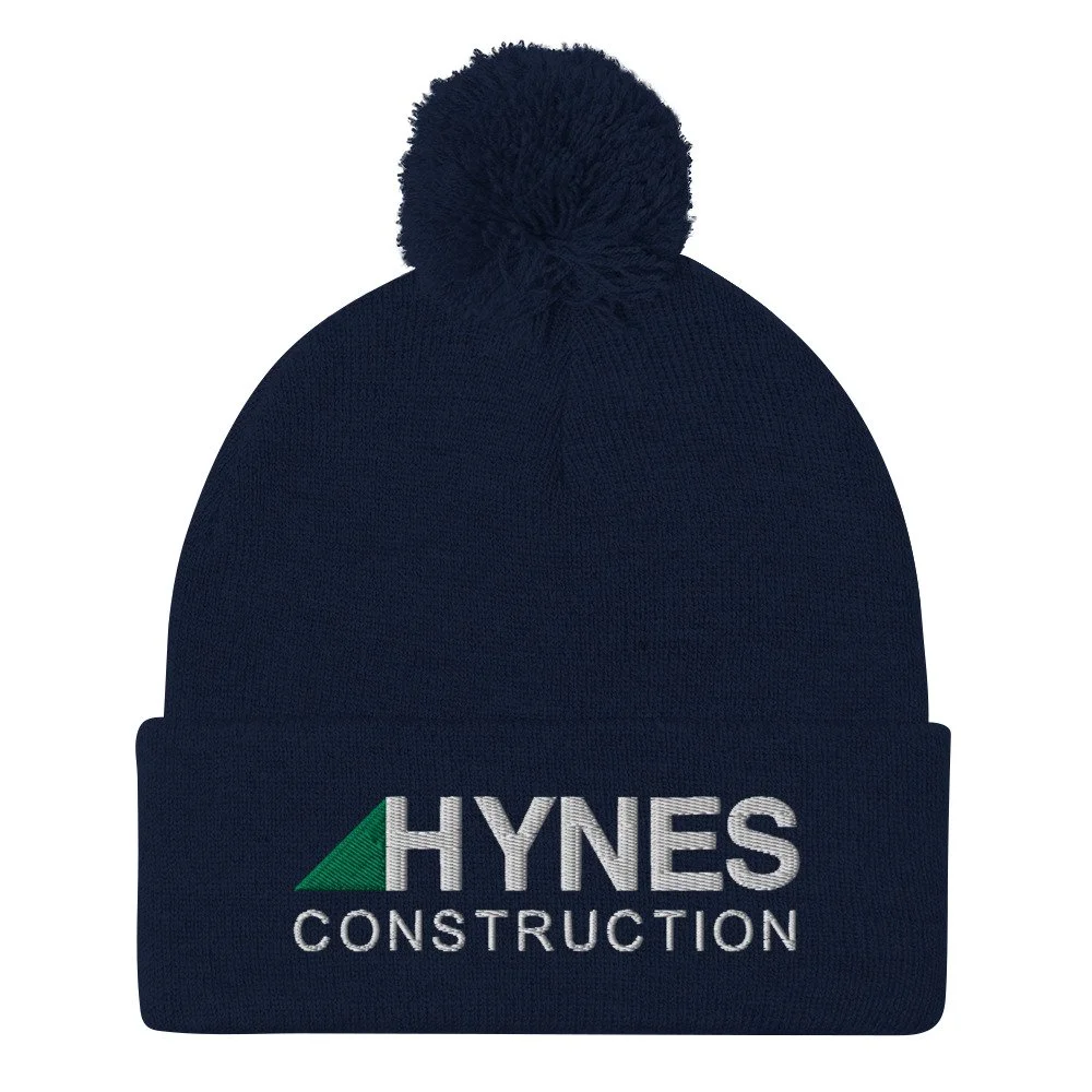 pom-pom-knit-cap-navy-front-6566a6379044d.jpg