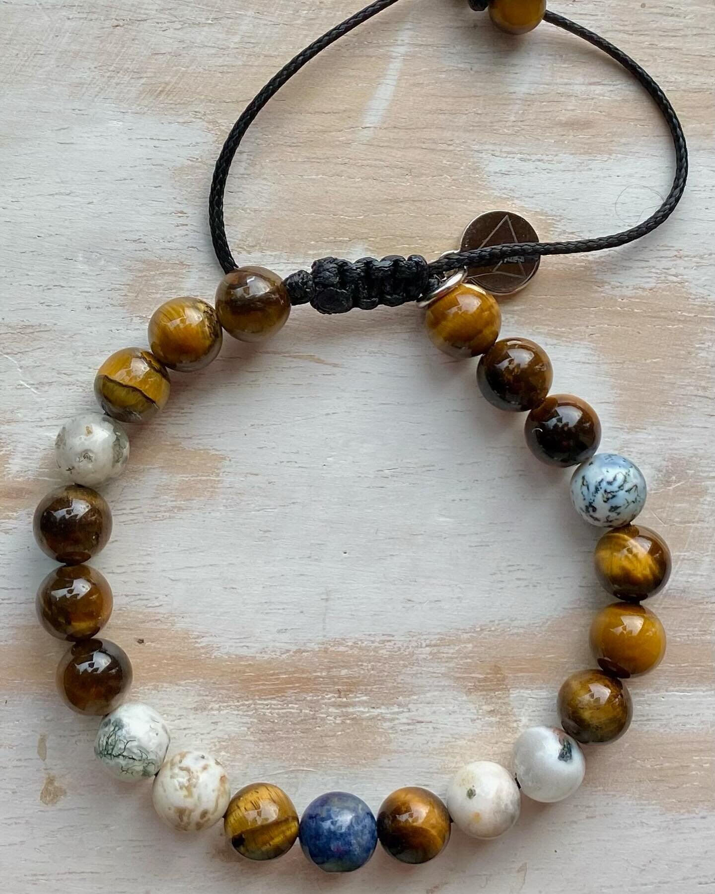 I&rsquo;ve been LOVING the pull style bracelets lately ✨ this one is a custom order that includes tigers eye, dendritic opal, and azurite! 💎🤍 #tigerseyestone #tigerseyejewelry #customjewelry #dendriticopalbracelet #azuritecrystal