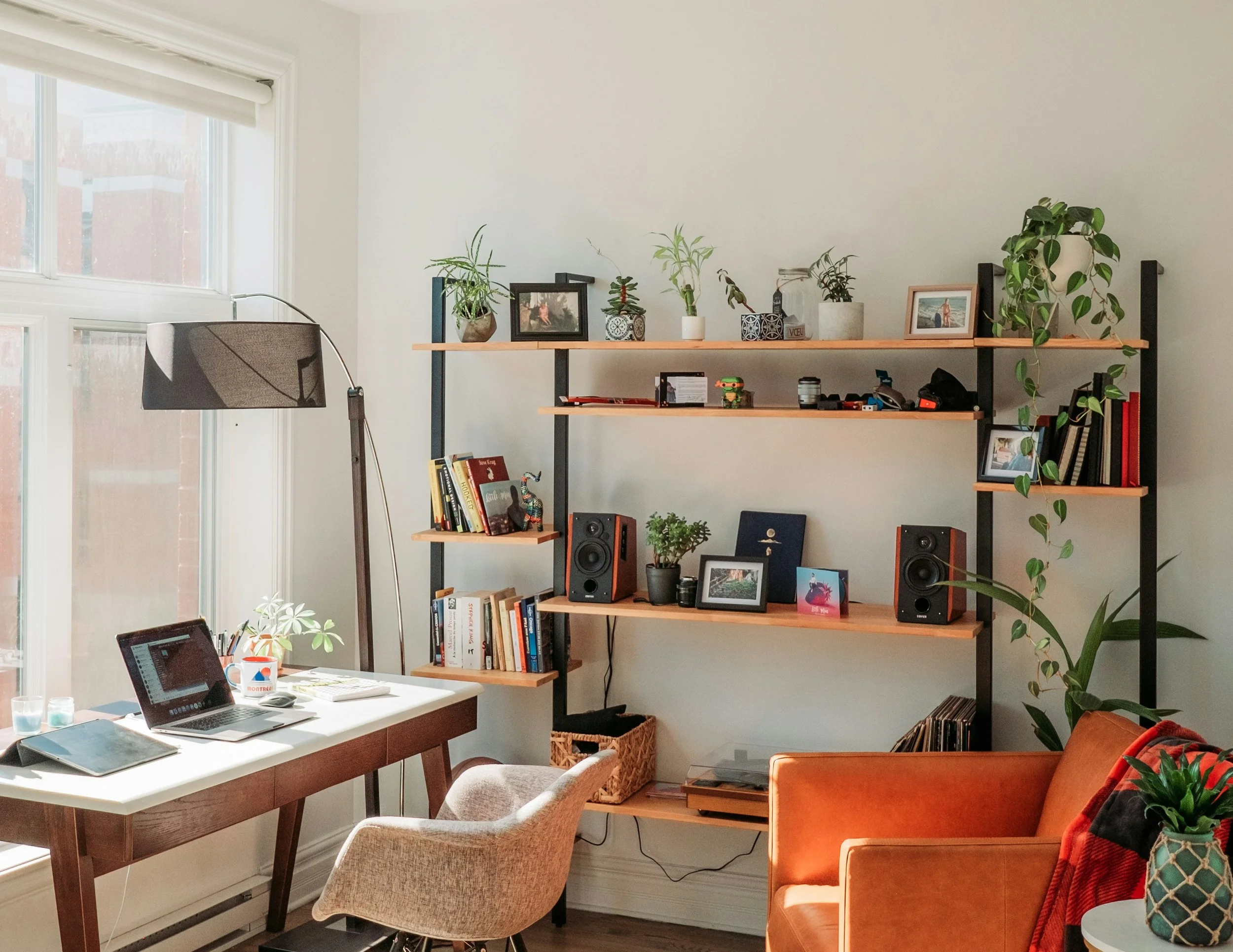 Well-organized small living space showing intentional organization for a college dorm or first apartment.