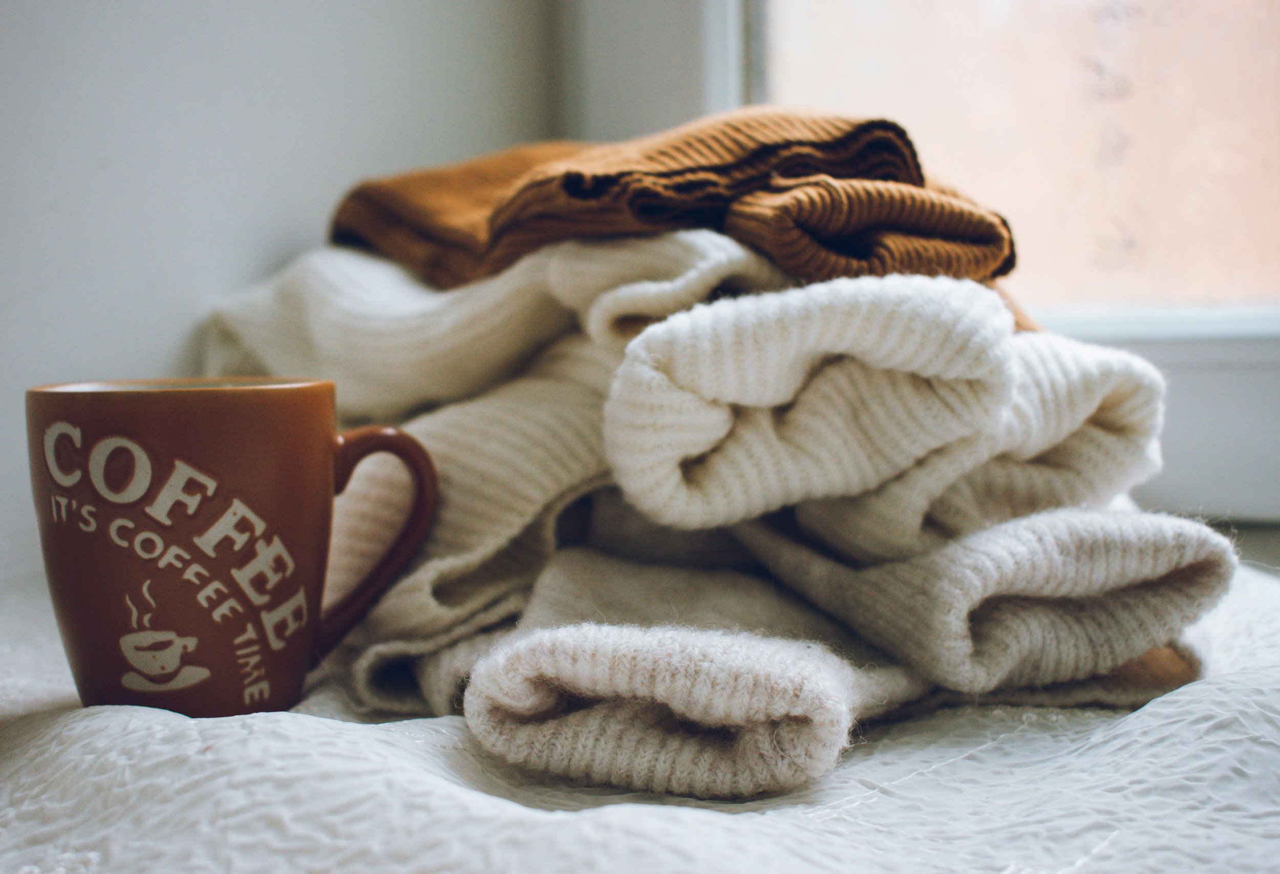 decluttering small NYC apartment before organizing storage systems