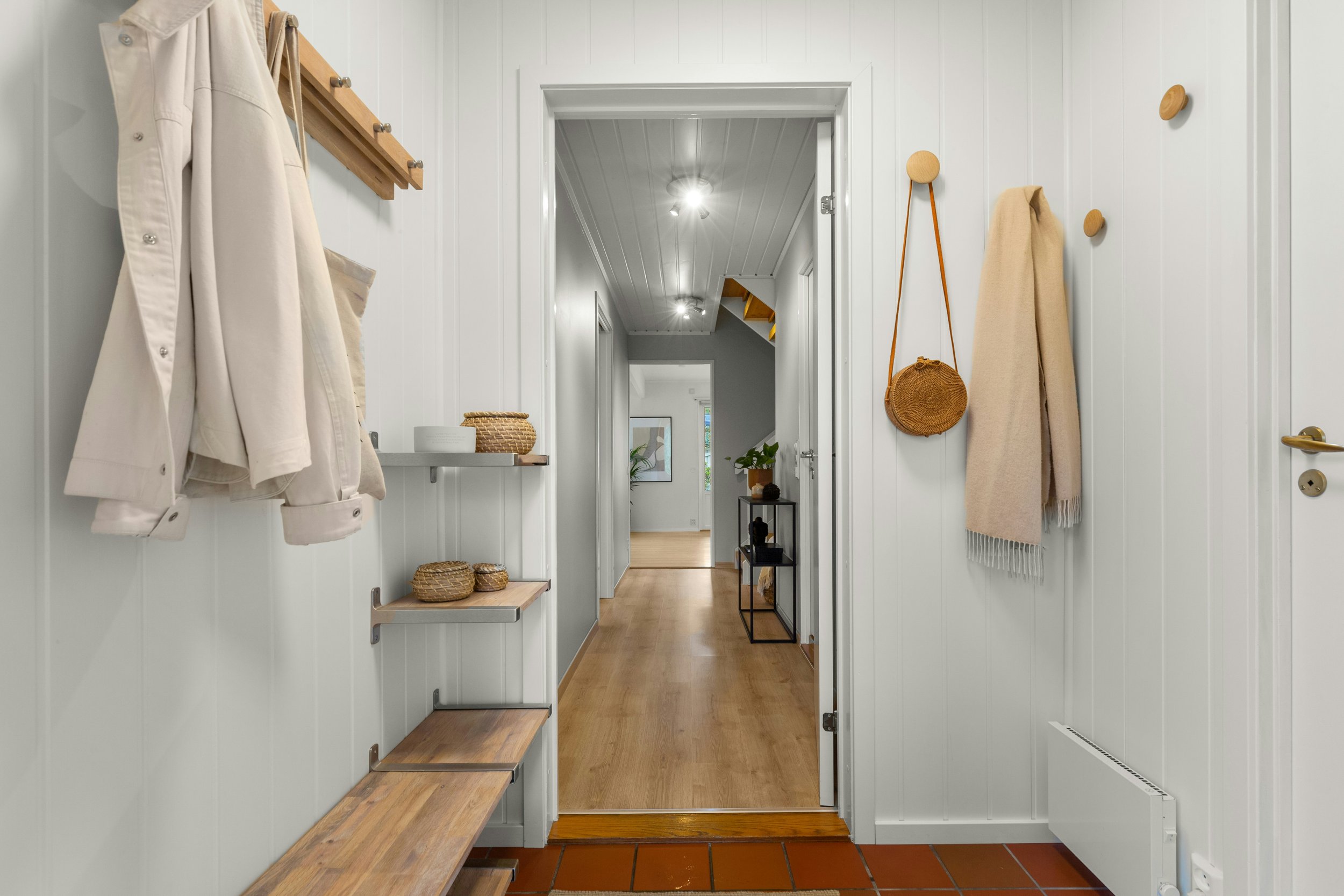 organized NYC apartment entryway with practical storage systems
