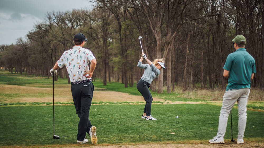 Woman golfer on teebox