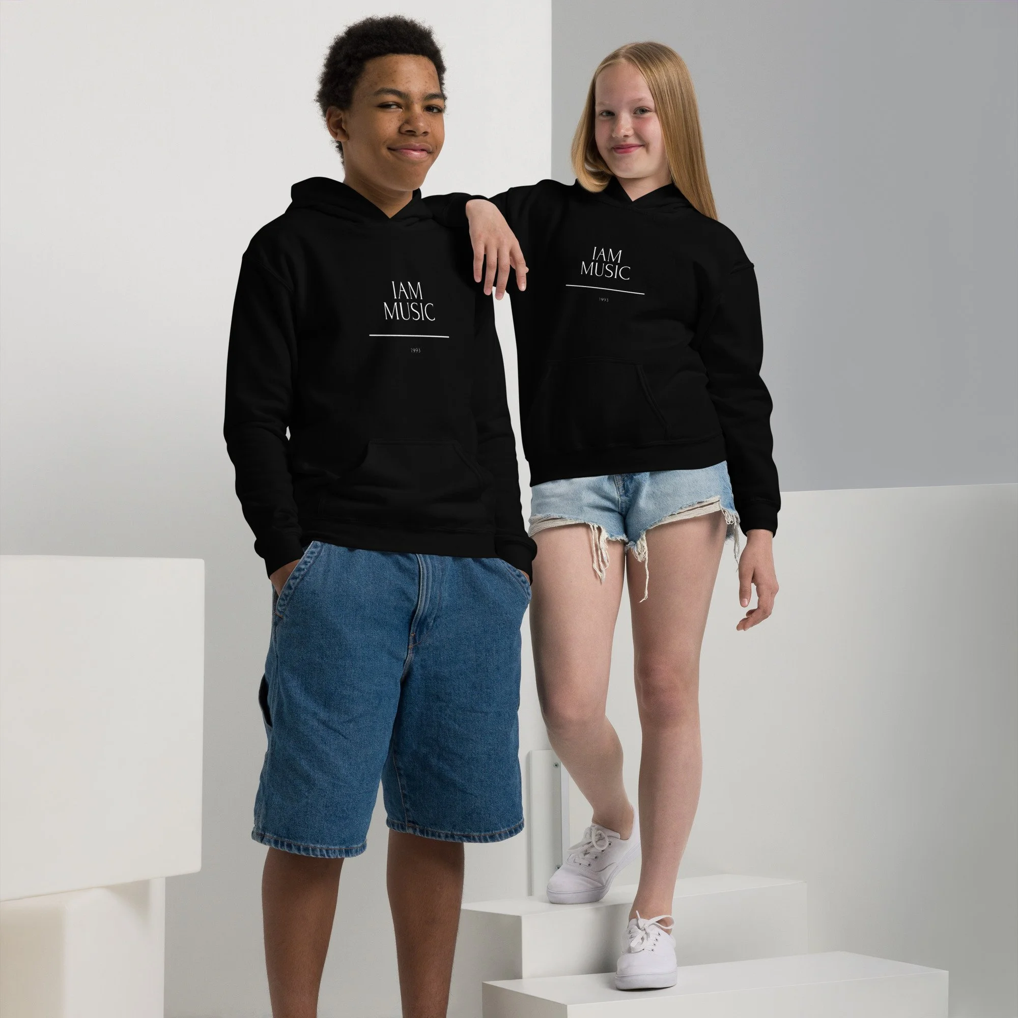 youth-heavy-blend-hoodie-black-front-66742c8715281.jpg
