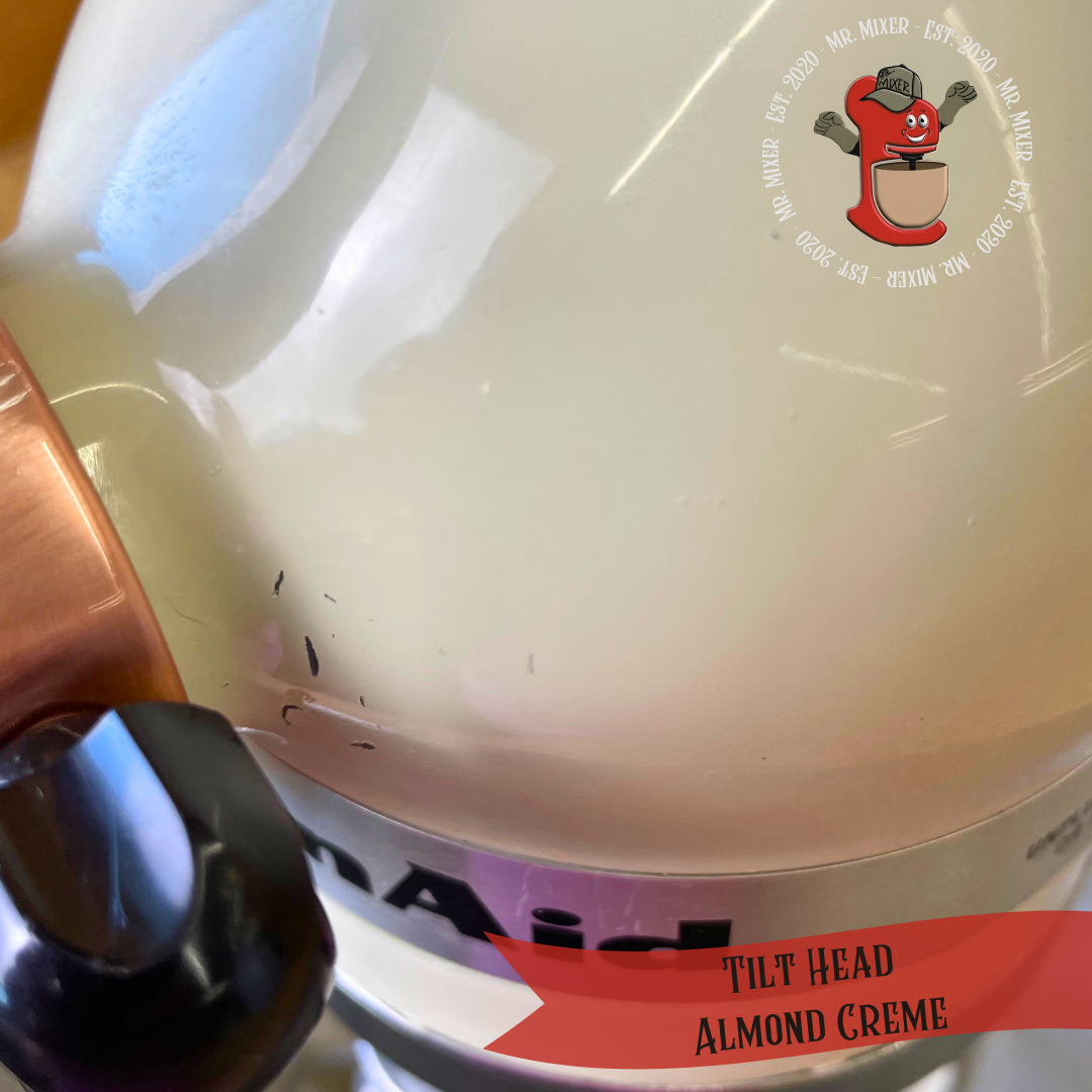 #689 Tilt Head Almond Creme.png