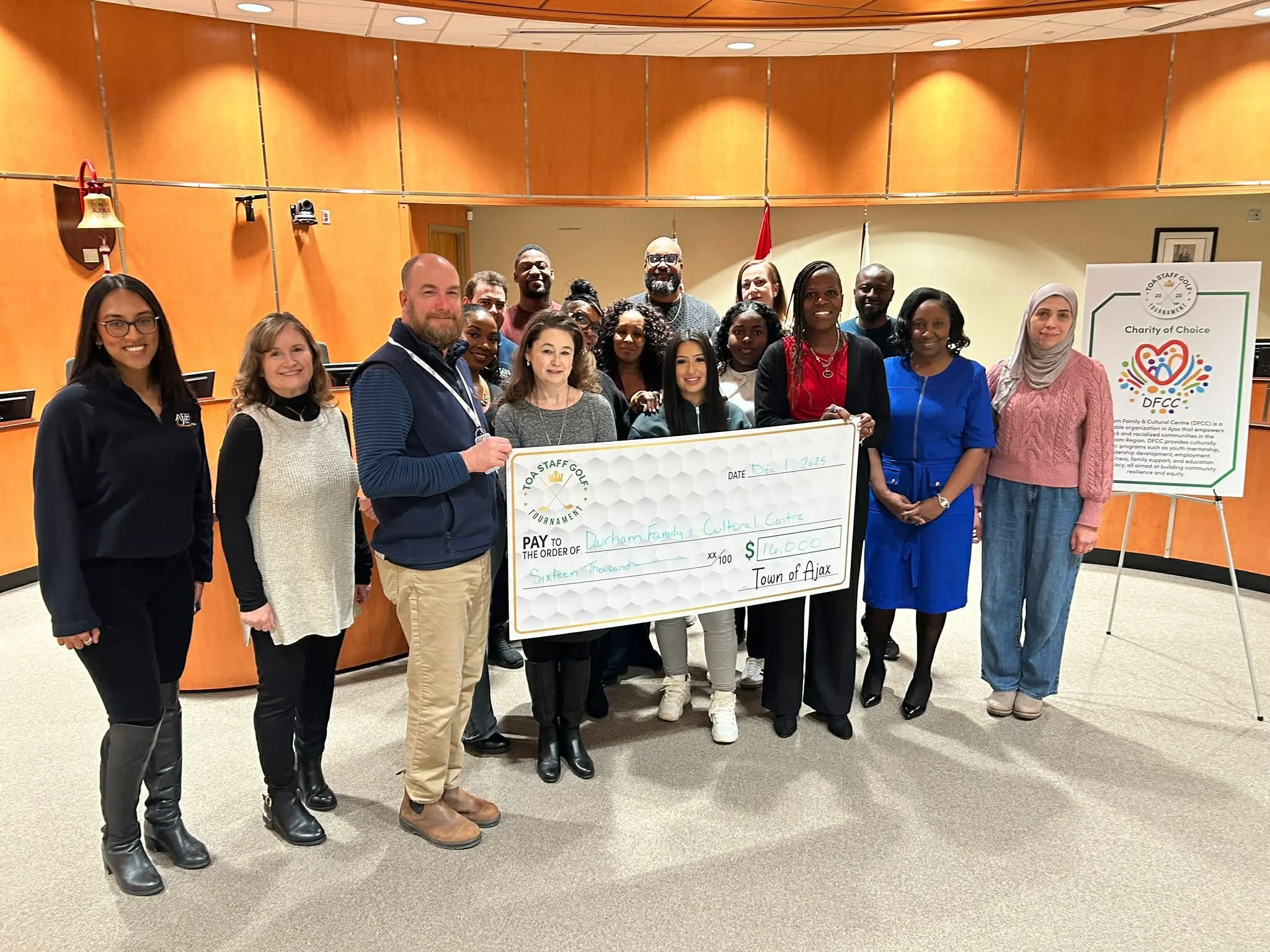 Town of Ajax staff presenting a donation cheque to Durham Family & Cultural Centre
