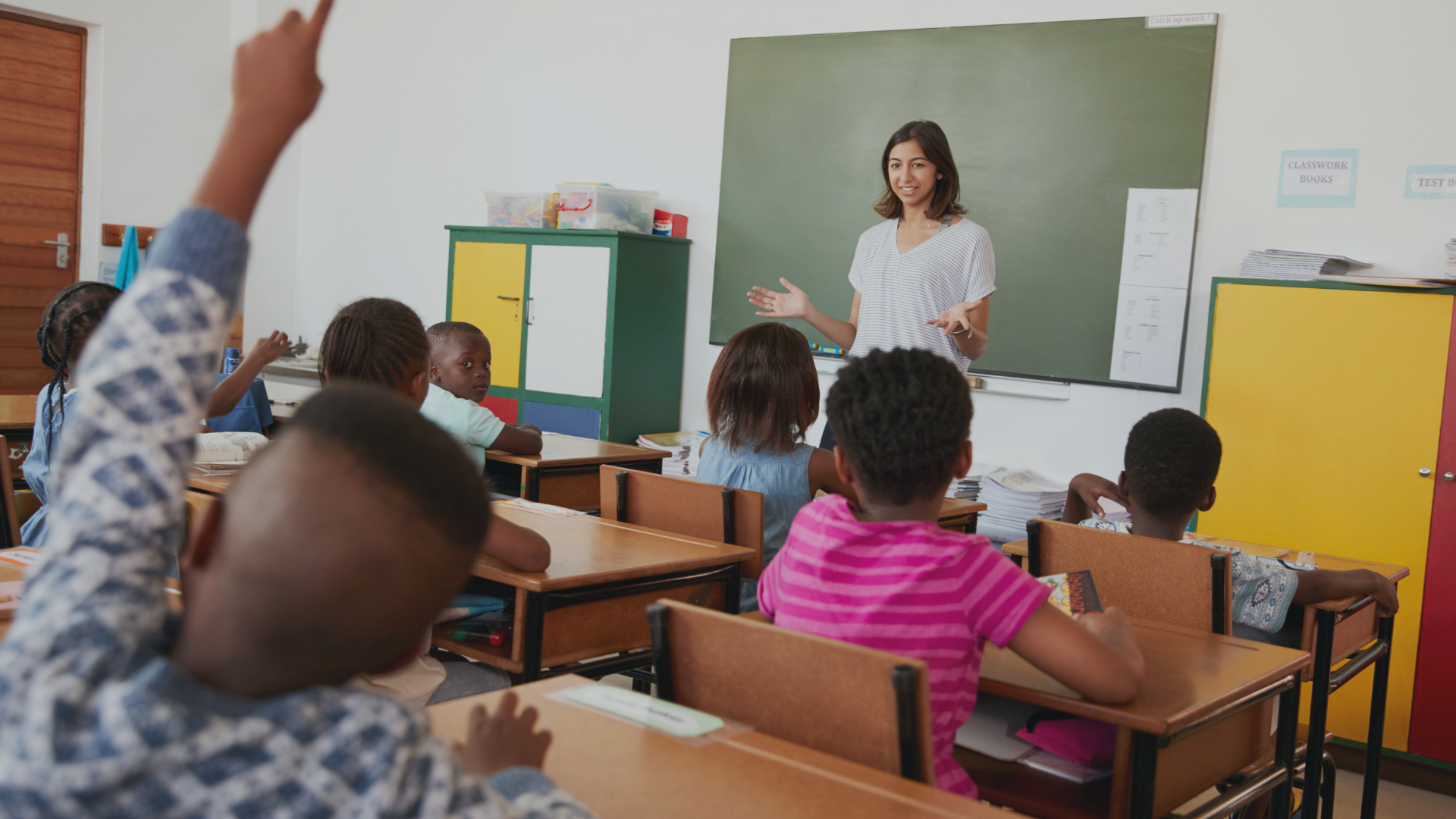 Students in a classroom with their teacher