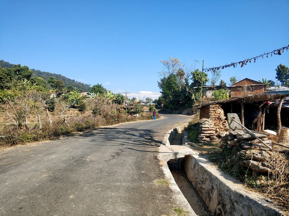  This is the moment when we realised that with a paved road through these villages they could actually be in Europe if you didn't look too closely.  NB: Out of the shot to the right is a house made out of mud and stones, and to the left there is a bu
