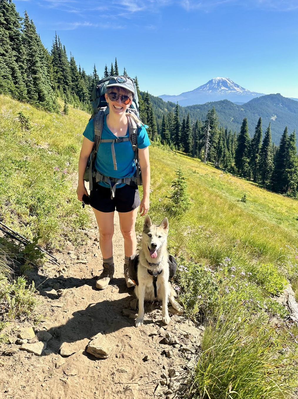 Alaina Boyle of Sequoia Teen Counseling Center on a hike with their dogs