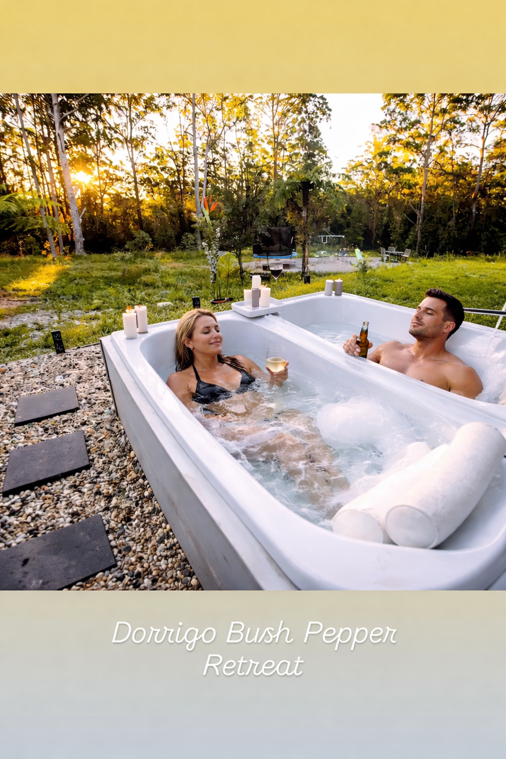 Outdoor dining table set with plates, wine glasses filled with red wine, cutlery, and a plant centerpiece on a covered porch with trees and sunlight in the background.