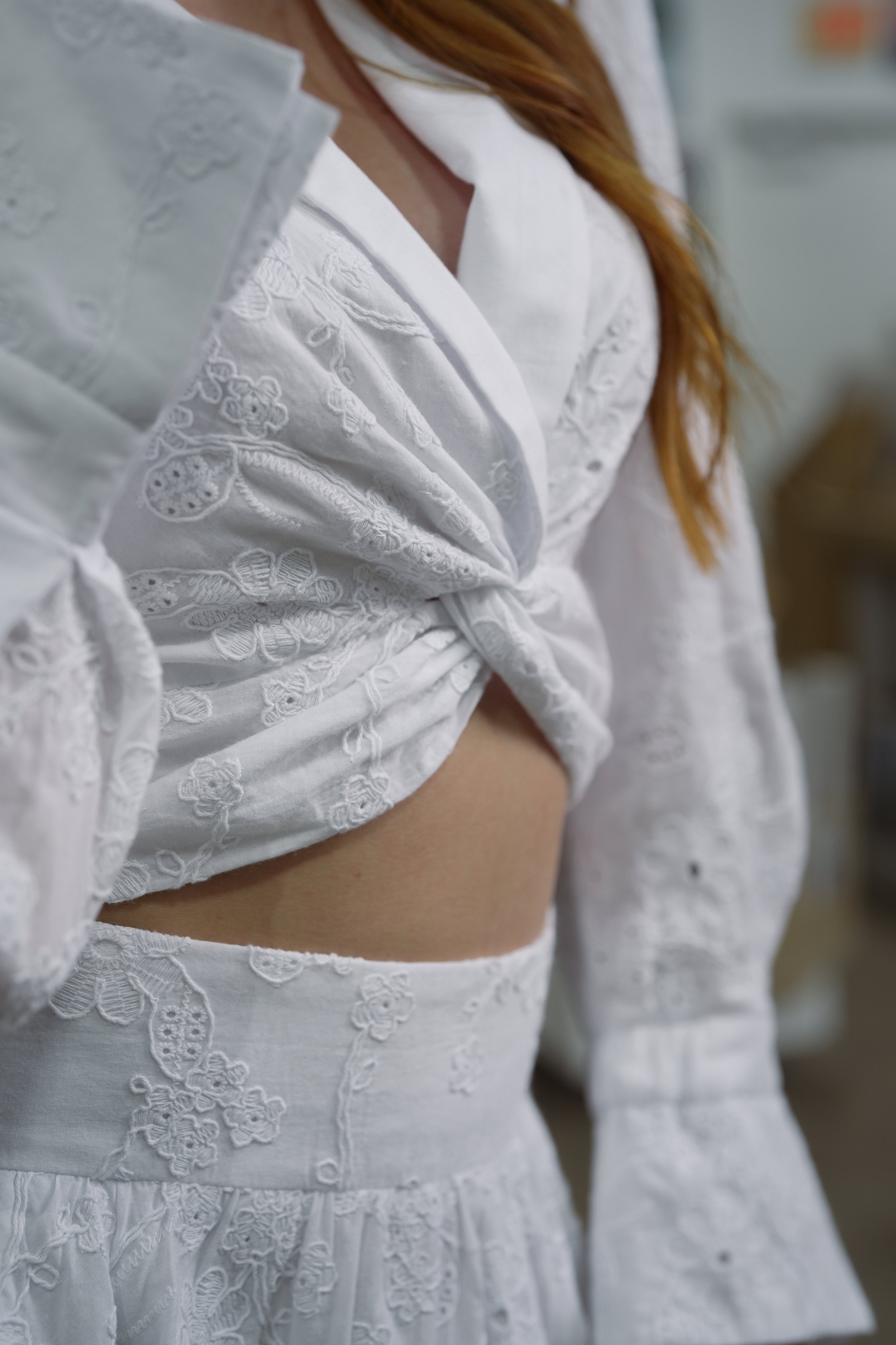 V neckline and delicate sleeves.
