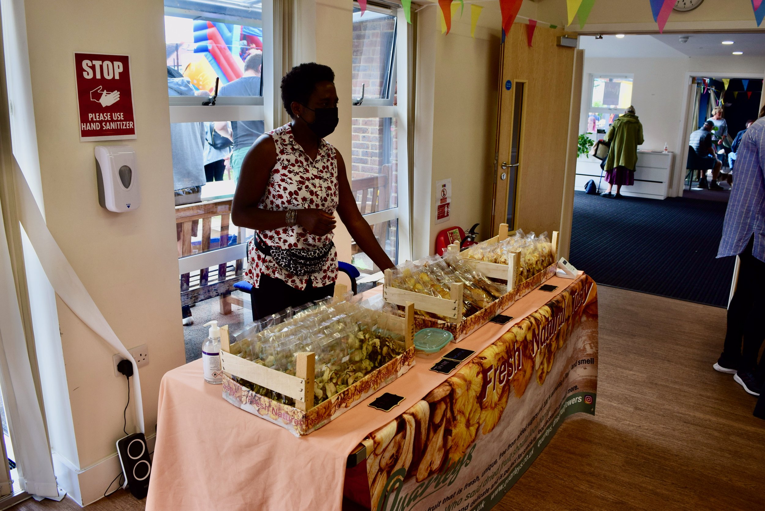 Dora Hanson Amissah from Quarley's selling her dried fruits in the market place