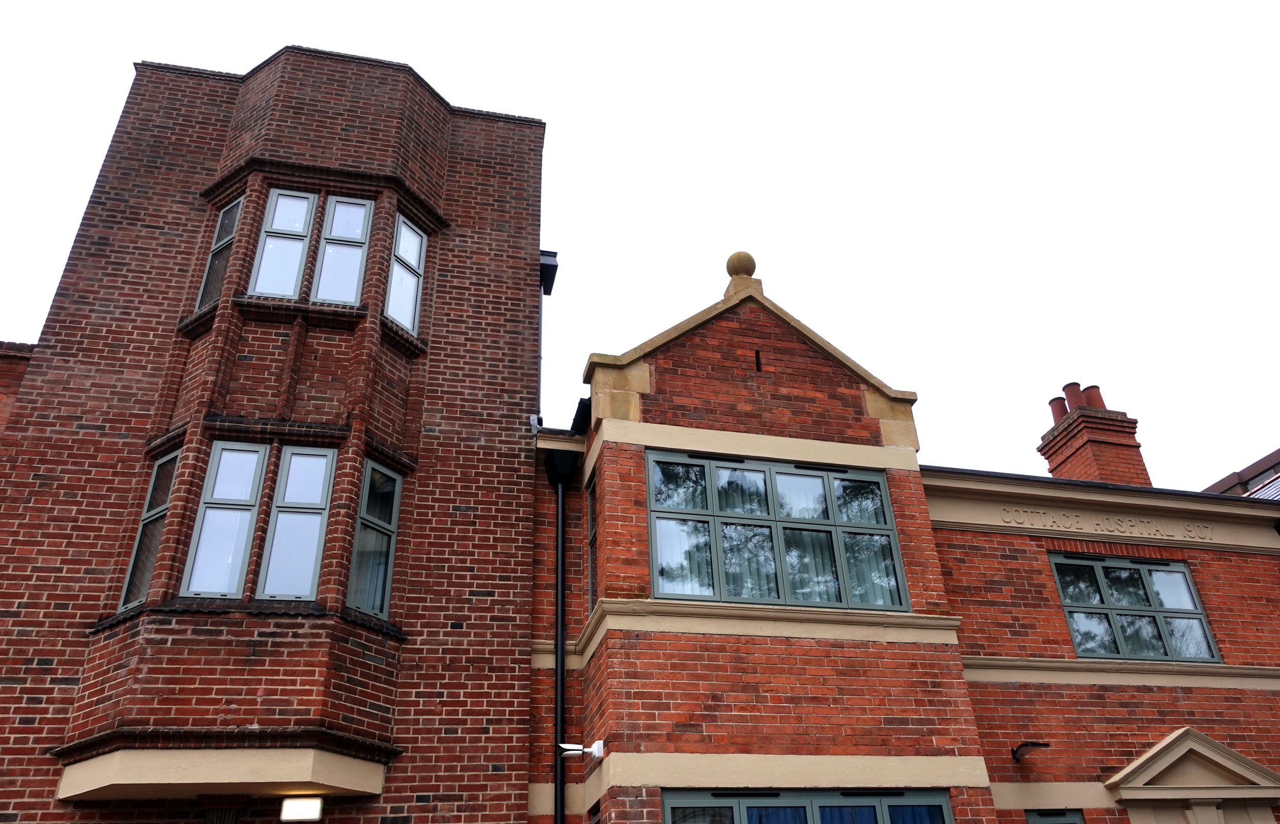 External view of Sutton Cottage Hospital following its £8.5 million redevelopment, combining modern healthcare facilities with the preservation of the building's historic heritage.