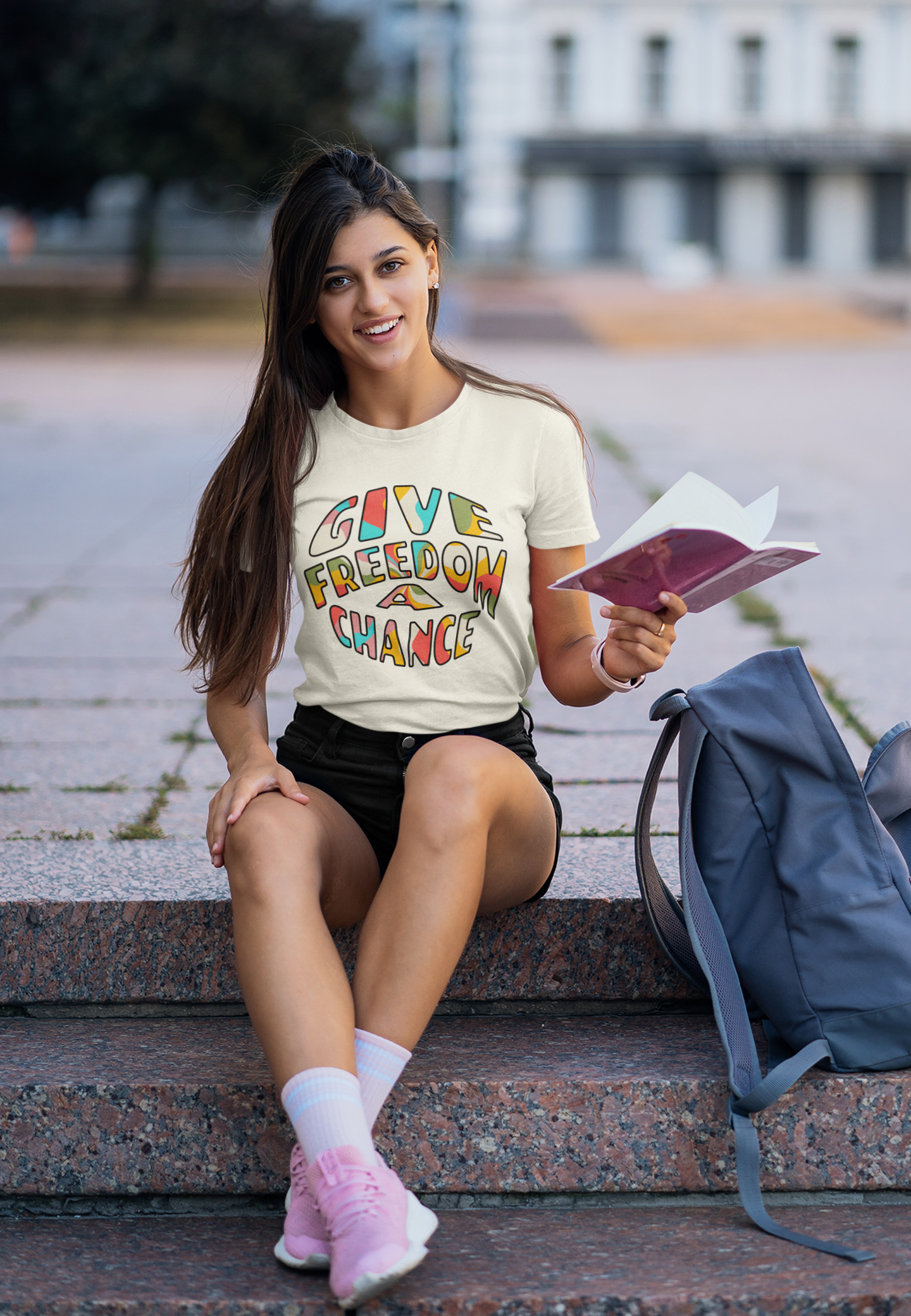 t-shirt-mockup-of-a-college-student-holding-a-book-41382-r-el2.png
