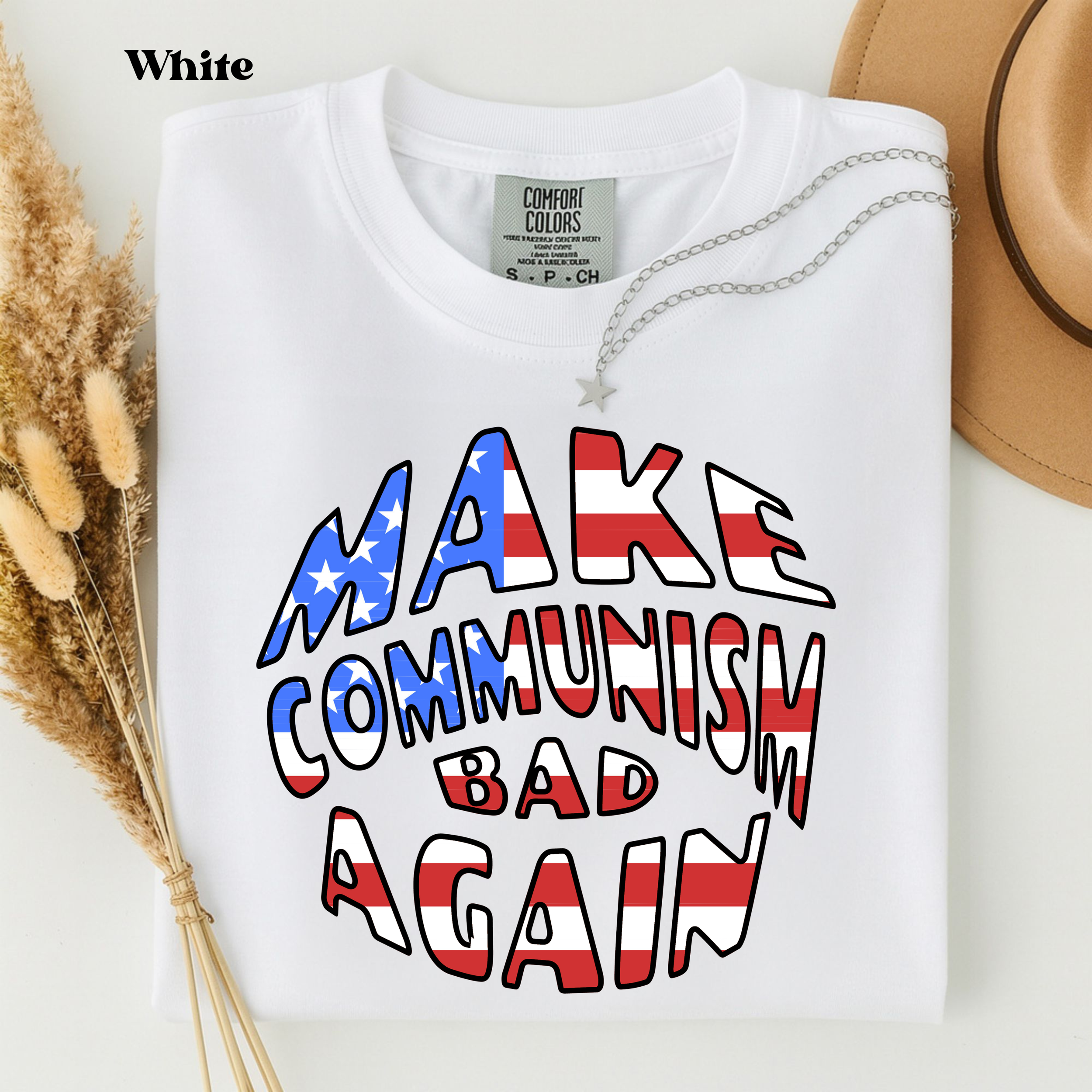 White Comfort Colors 1717 t-shirt featuring the Make Communism Bad Again design with American flag stars and stripes lettering