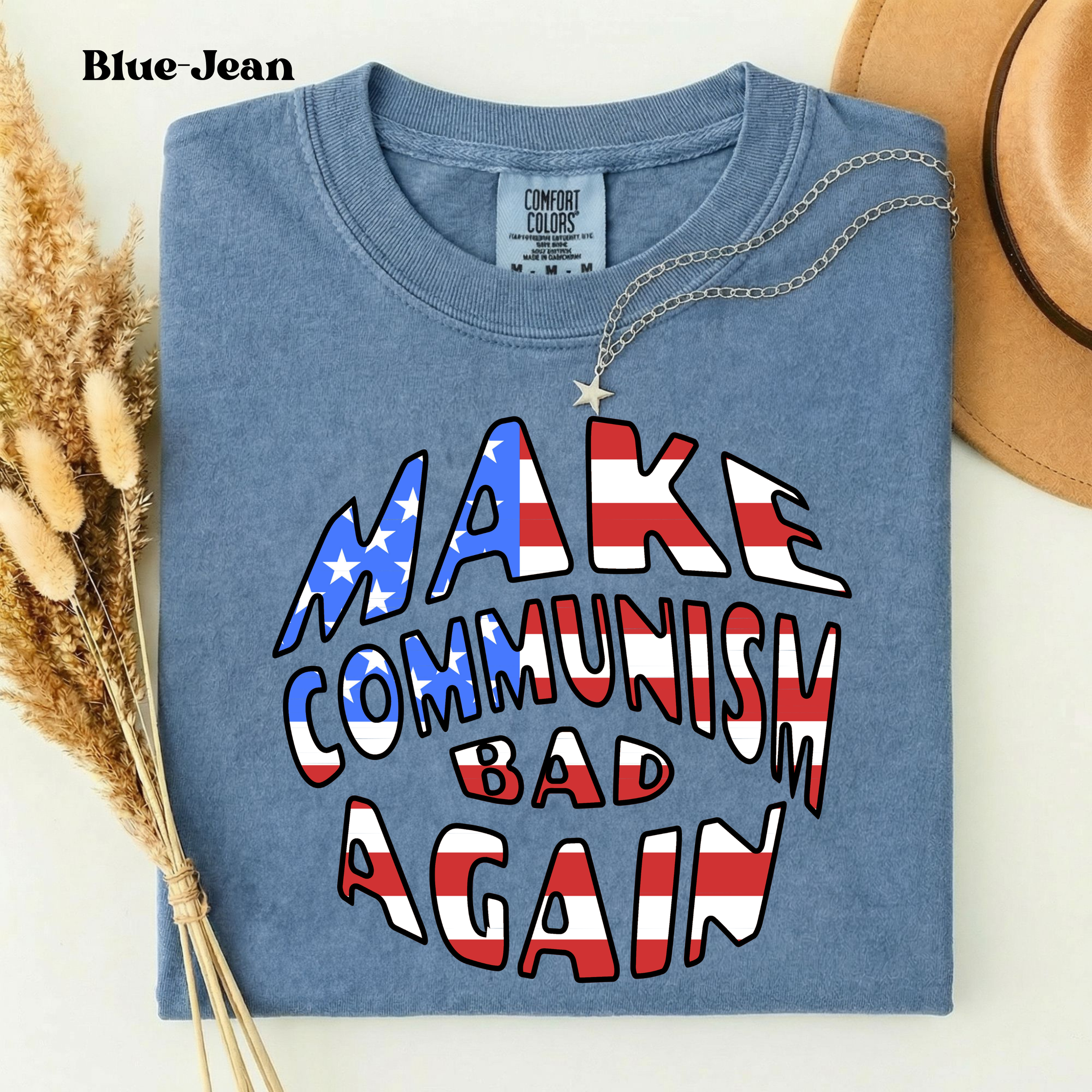 Blue Jean Comfort Colors 1717 t-shirt featuring the Make Communism Bad Again design with American flag stars and stripes lettering