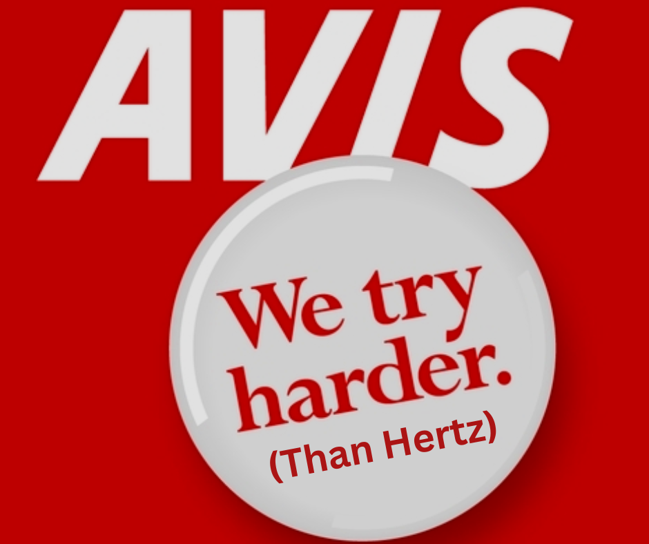 Red Avis sign with the slogan "We try harder." in the center.