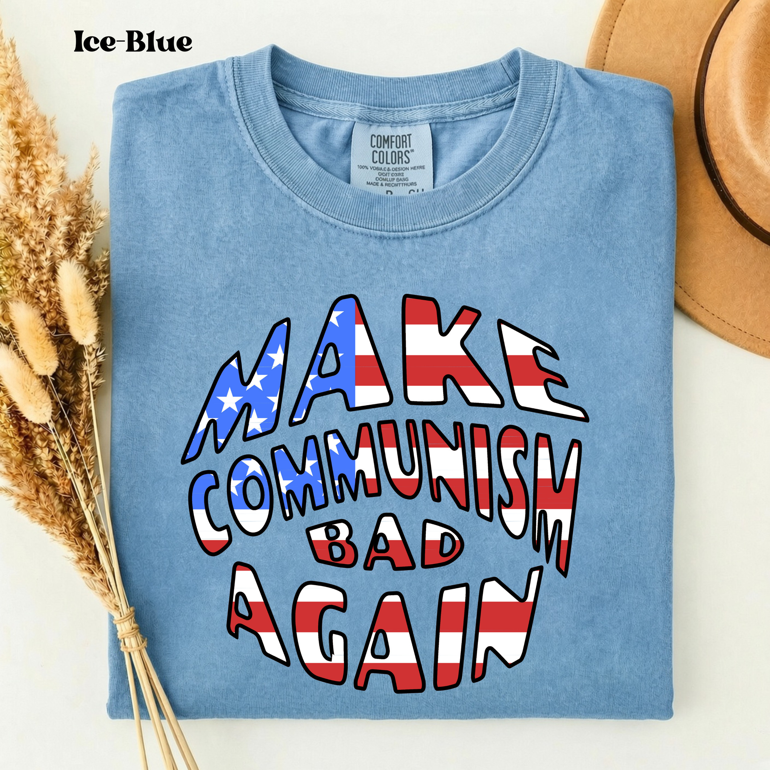 Ice Blue Comfort Colors 1717 t-shirt featuring the Make Communism Bad Again design with American flag stars and stripes lettering