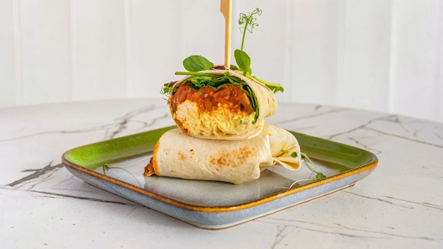 Rise + Shine Wrap 🌯

Tofu scramble, miso mushrooms, house beans, spinach in a tortilla wrap. Maybe you don&rsquo;t fancy quite the full breakfast. Here&rsquo;s your go to lunch staple: in-house or on-the-go. 🔥

📸 @helen_yandell_food_interiors