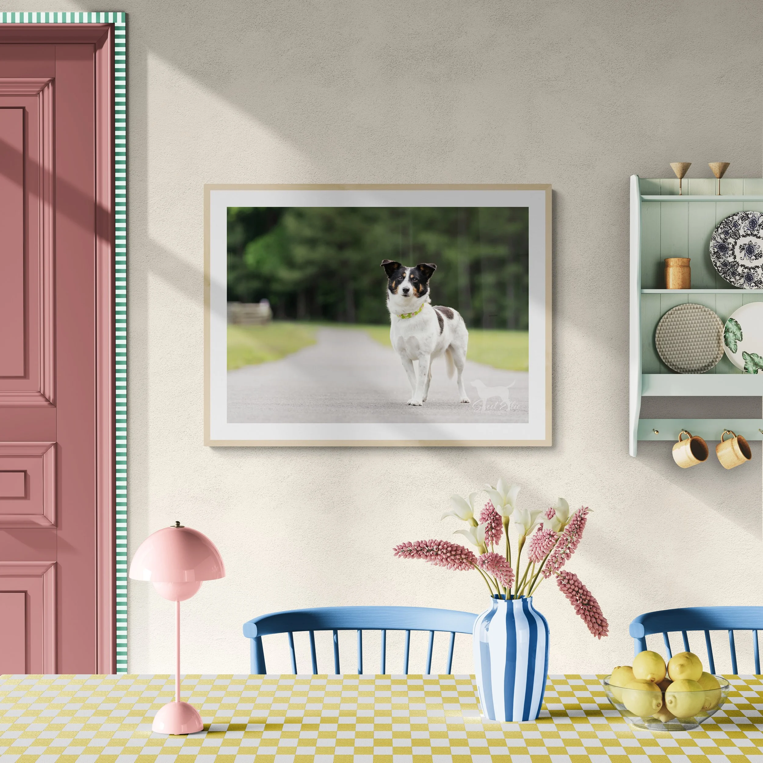 Framed artwork of a dog on a path