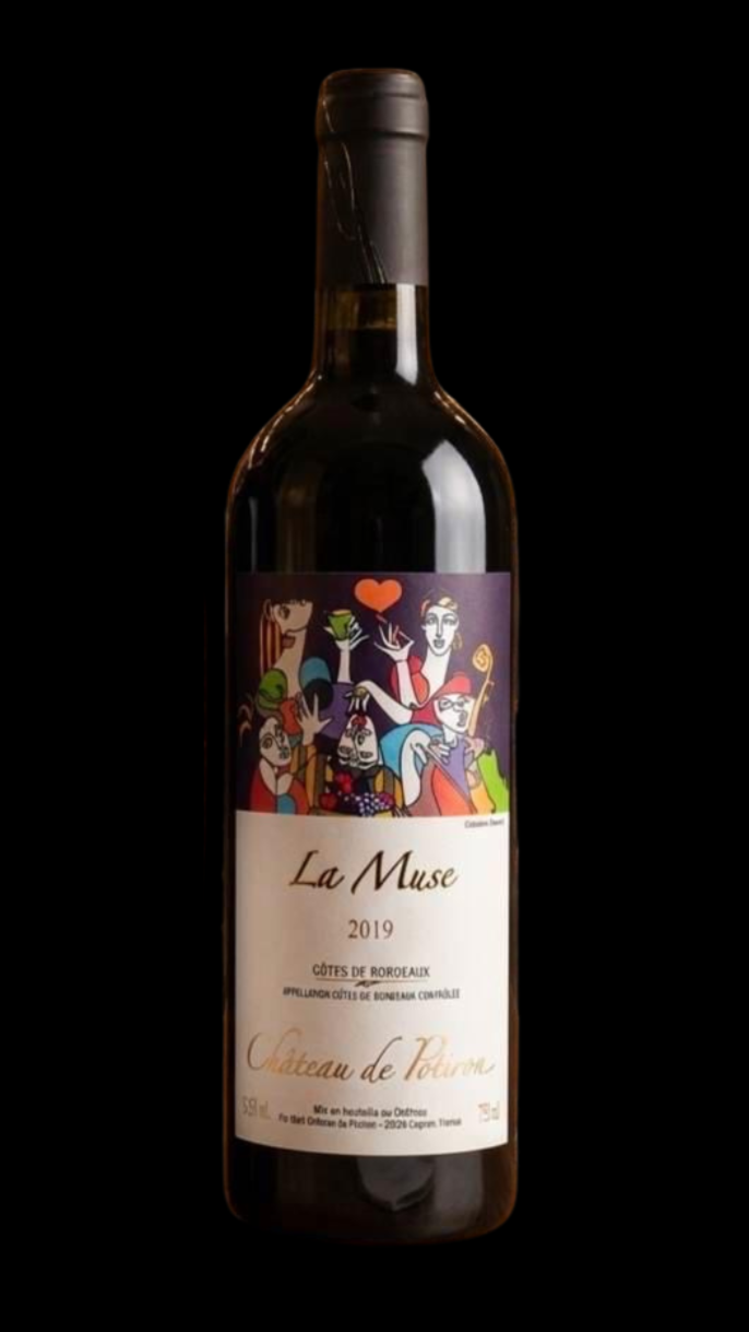 A bottle of red wine featuring a colorful label depicting bold women with a heart symbol, the text 'La Muse 2019', France.