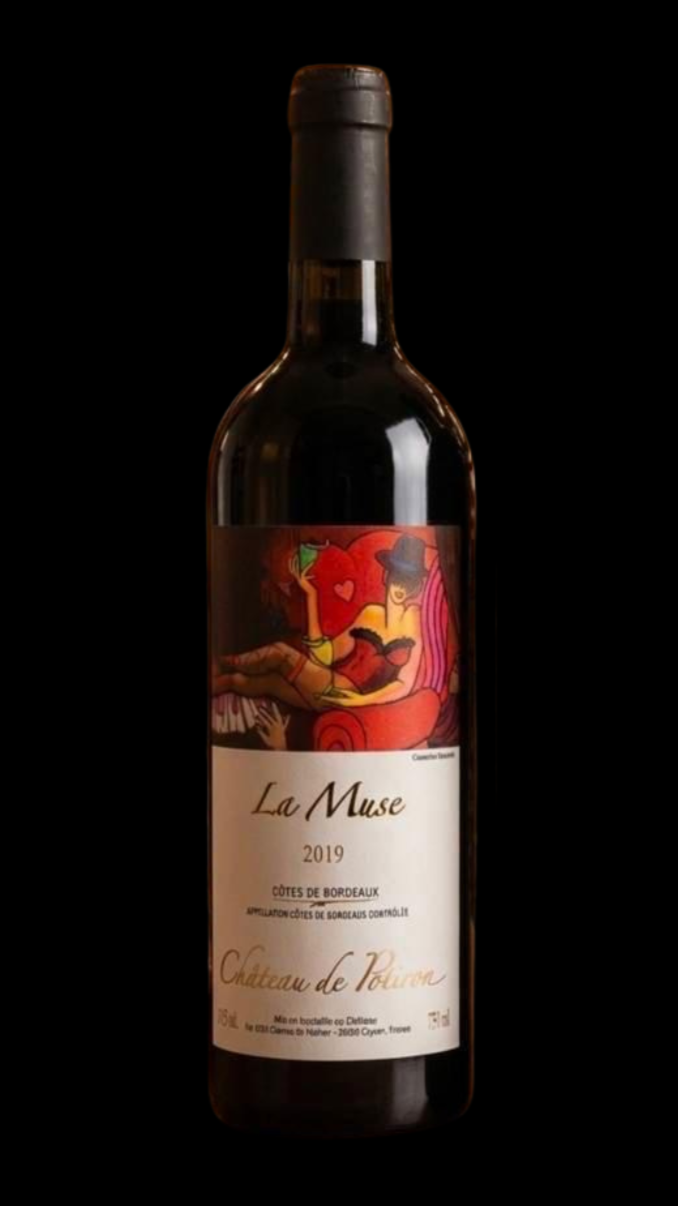 A bottle of red wine with a label featuring a colorful illustration of a woman with a hat, lying on a pink and red background, and the text "La Muse, 2019, Côtes de Bordeaux".