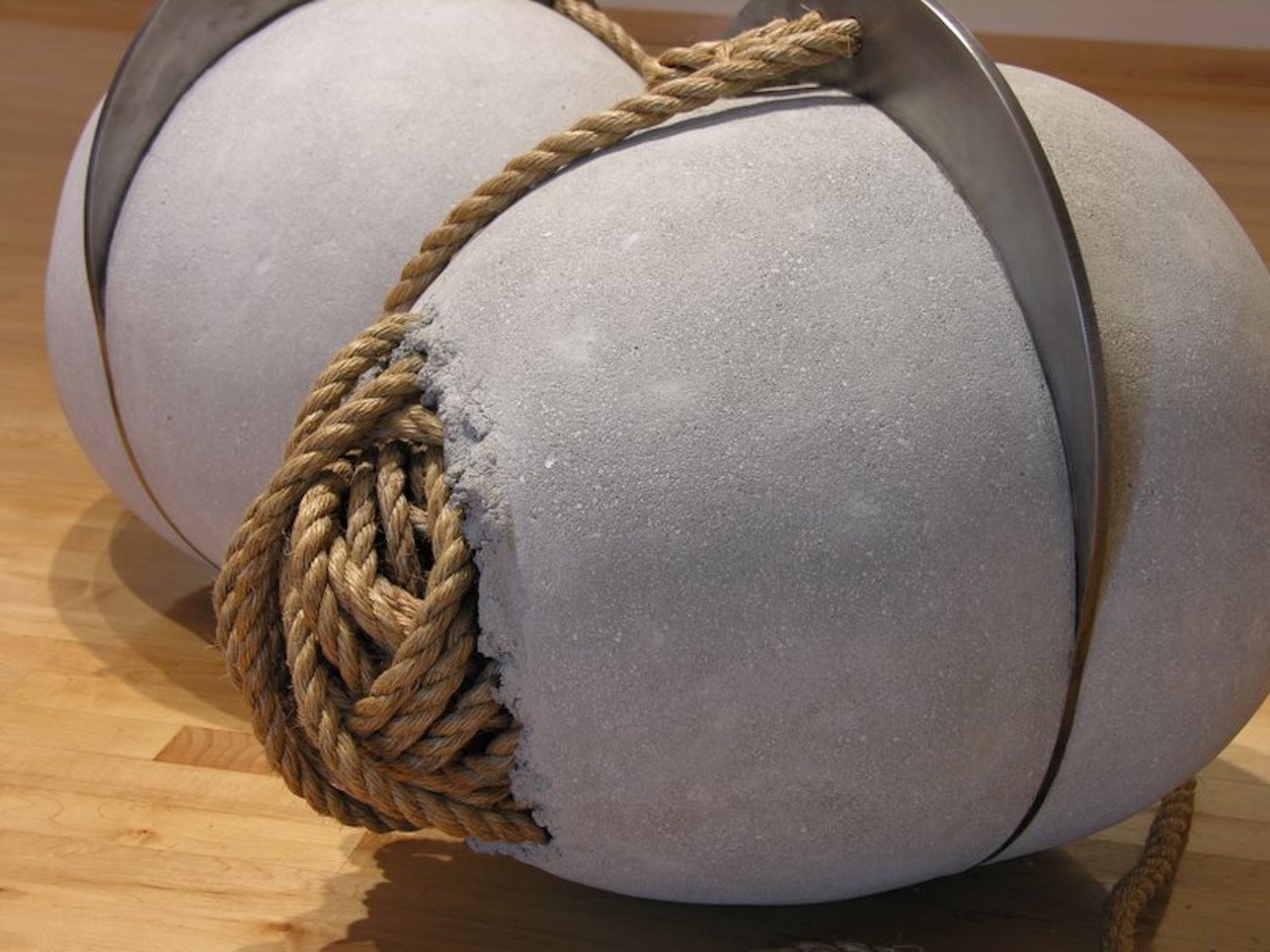 STOPPERS: concrete, mild steel, 3/4" rope