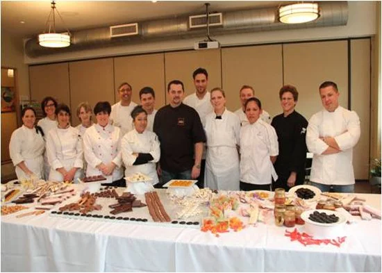 Image from the Institute of Culinary Education article featuring Chef Jean-Marie Auboine teaching artisan confection techniques.