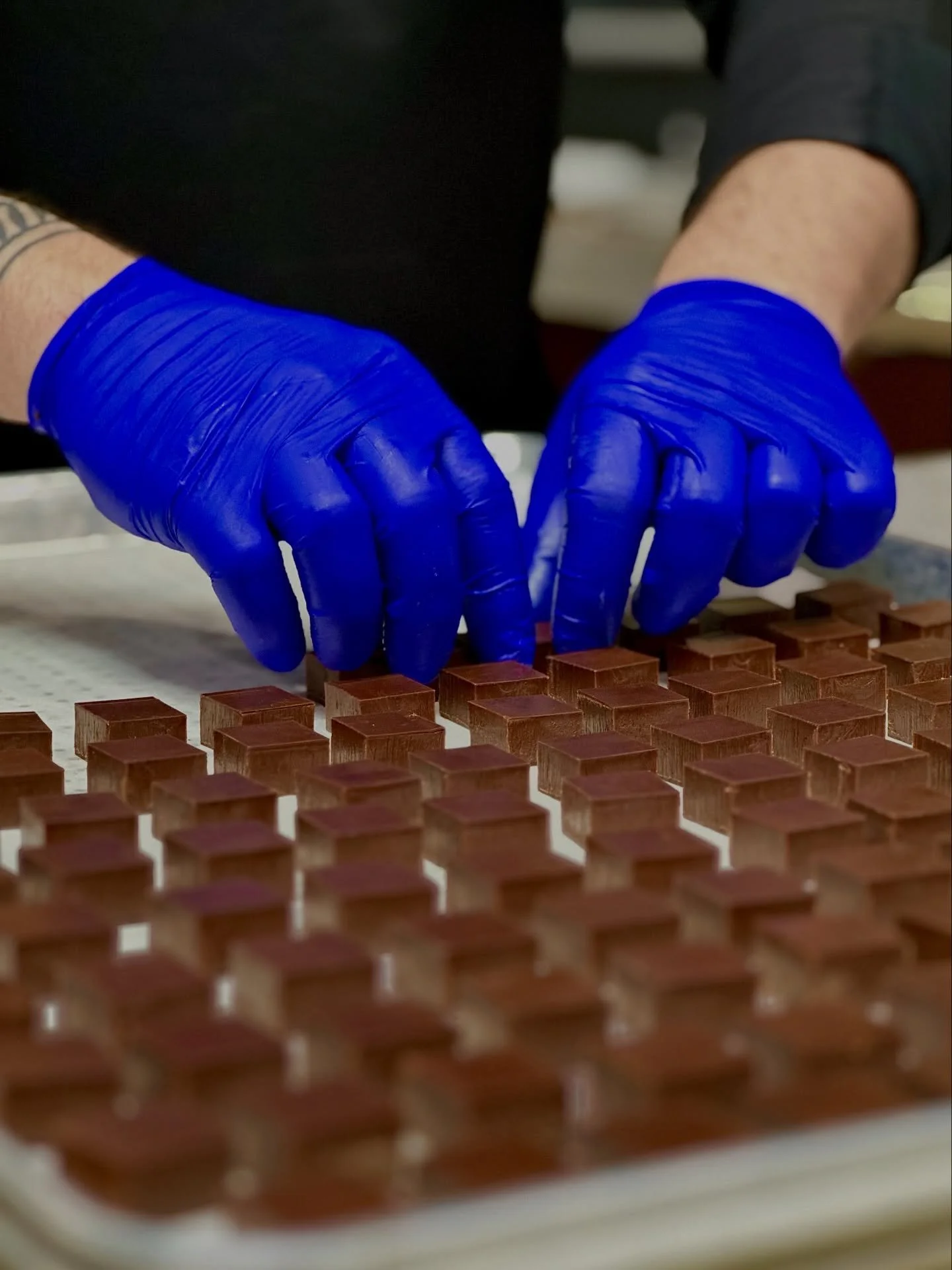 We are using a different method and technology to cut and separate our chocolates before they get enrobed in the chocolate machine, would you like to see it? #waterjet #ganache #chocolates