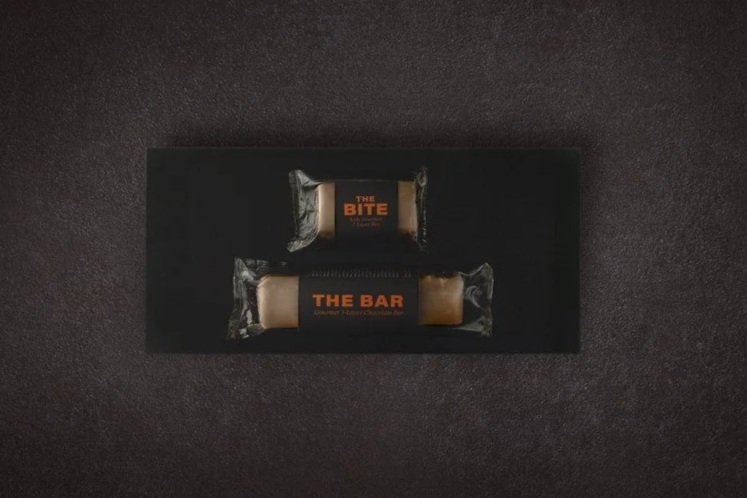 Retail-ready Lion Bar and Lion Bite chocolate confections for grab-and-go markets, gift shops, and hospitality displays.
