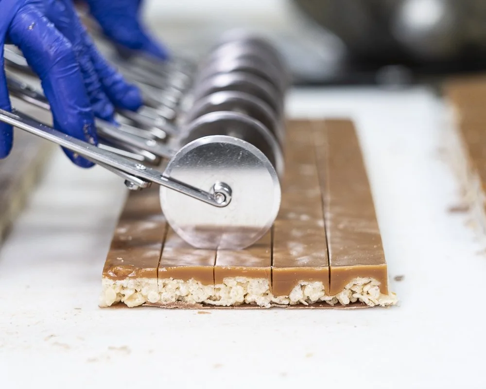 Gourmet chocolate Candy bar made with quality ingreidents: rice crispy, sea salt caramel, hazelnuts praline and premium milk chocolate by Jean-Marie Auboine