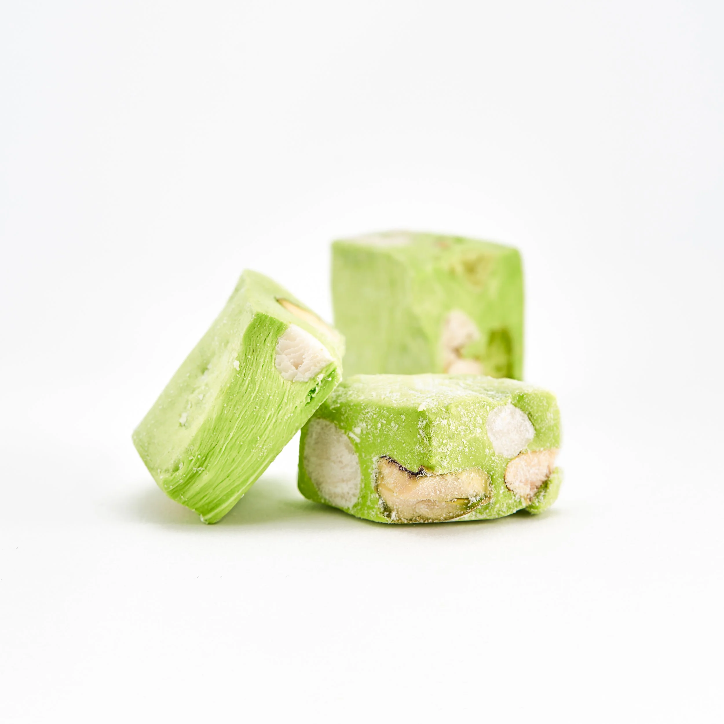 Handcrafted pistachio nougat made with honey, pistachios, and traditional confectionery techniques.