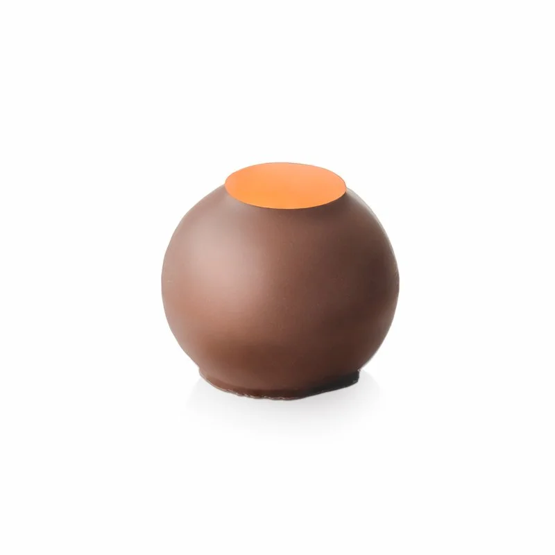 Passion Fruit Ganache in milk ganache as a perfect pairing for a bright flavor handcrafted by Jean-Marie Auboine Chocolatier