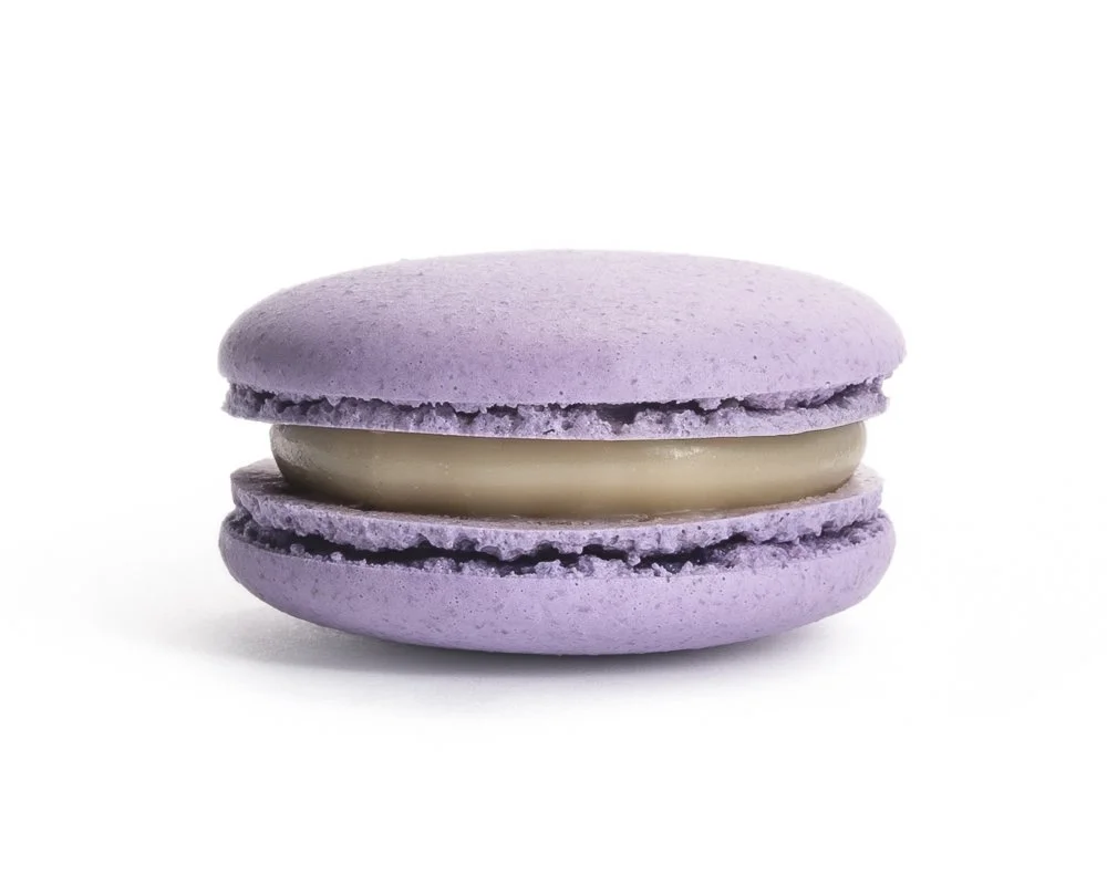Lavender Honey French macaron featuring floral lavender notes balanced with natural honey sweetness.