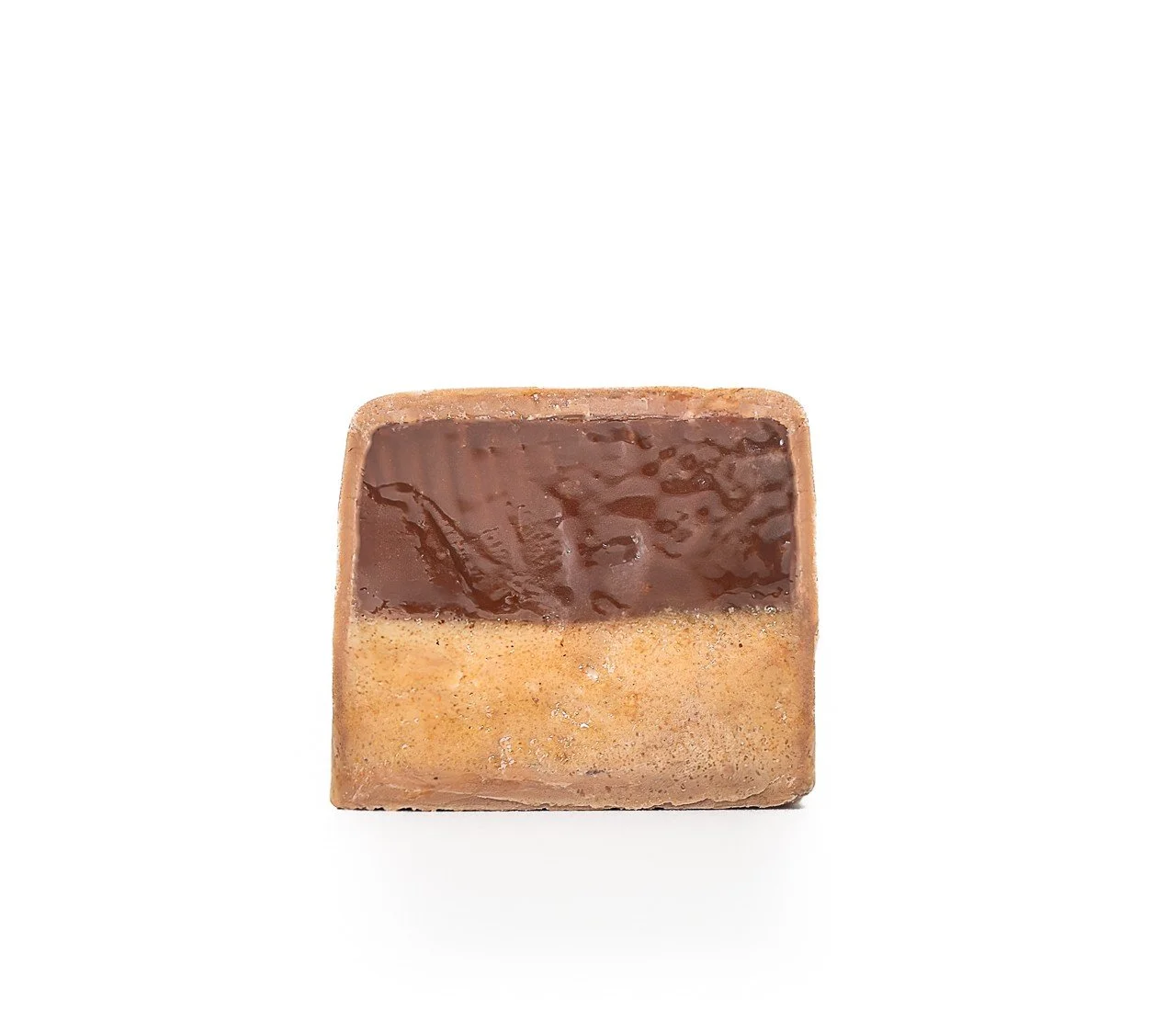 Decadence Bar featuring layers of sea salt caramel ganache and house-made hazelnut praline.