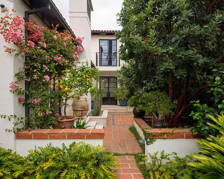 melinda-ritz-bevhills-spanish-berkus-home-exterior-side.jpg